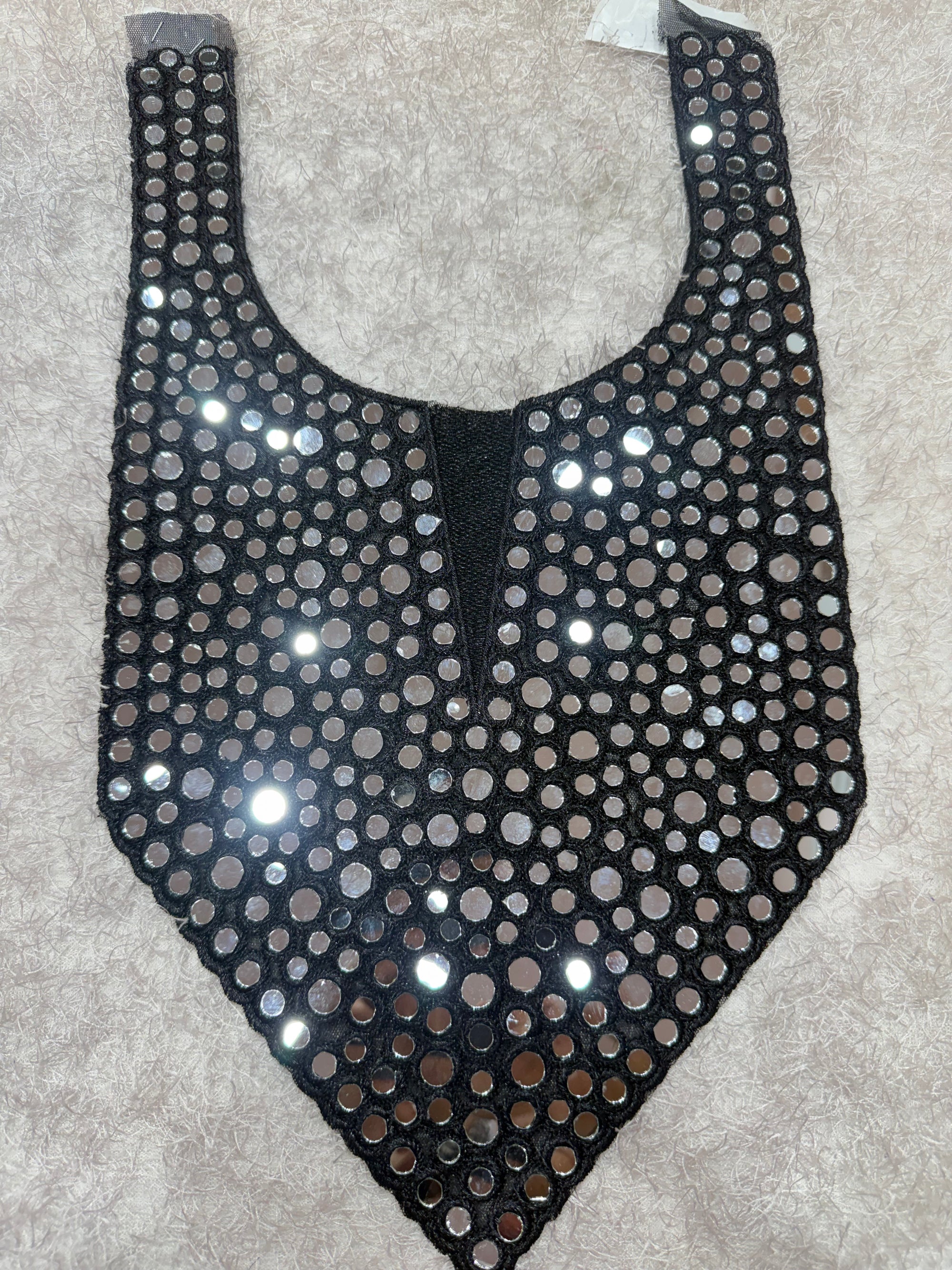 Embroidered neck piece