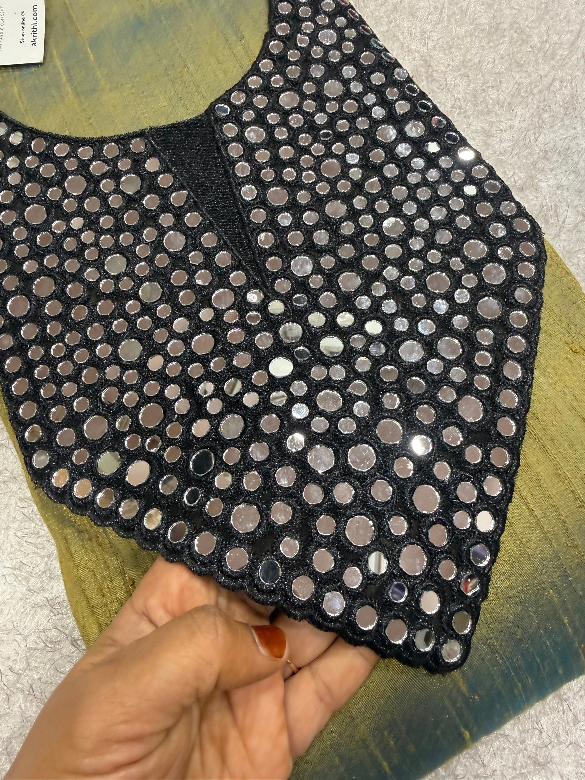 Embroidered neck piece