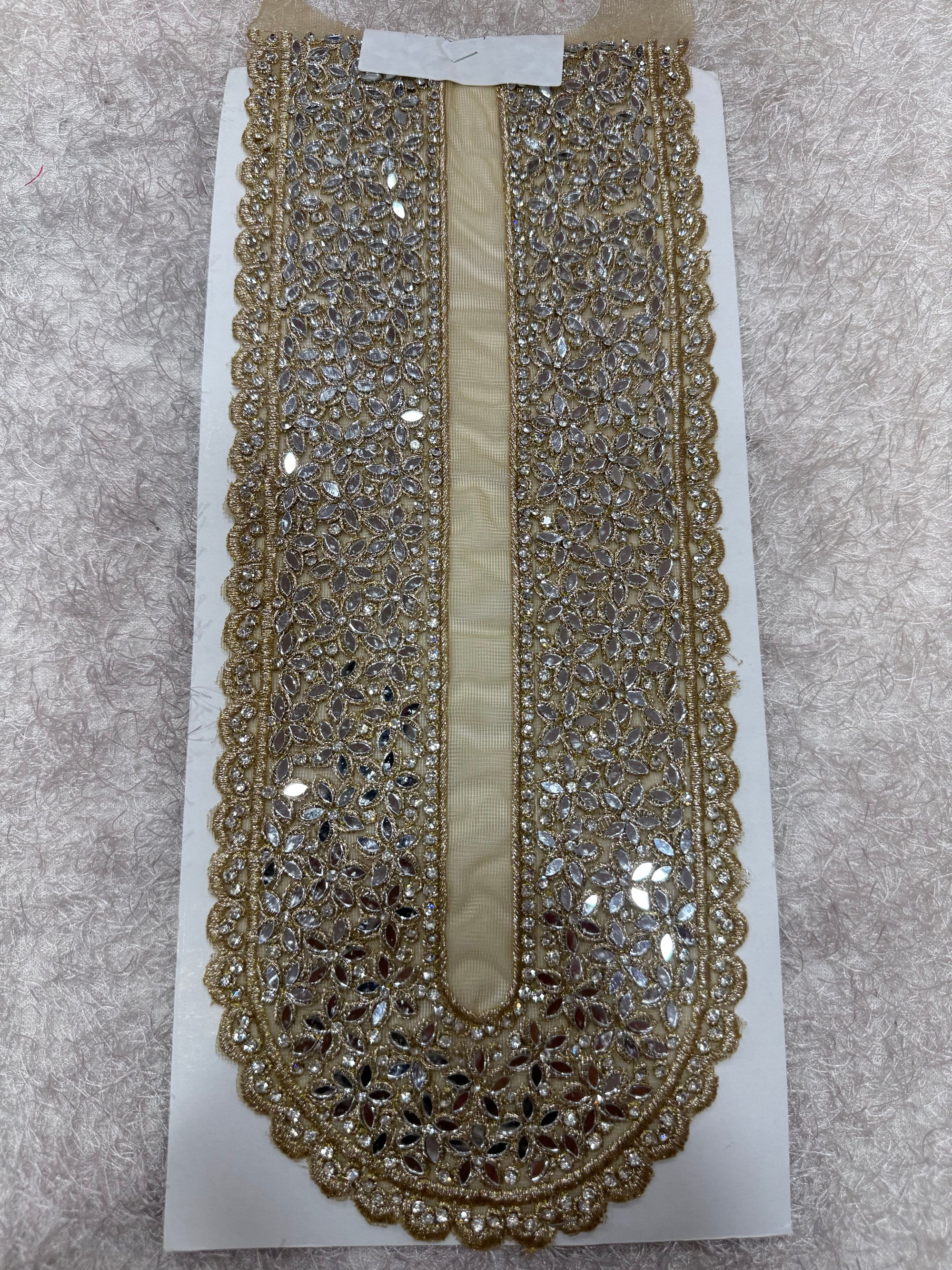 Embroidered neck piece