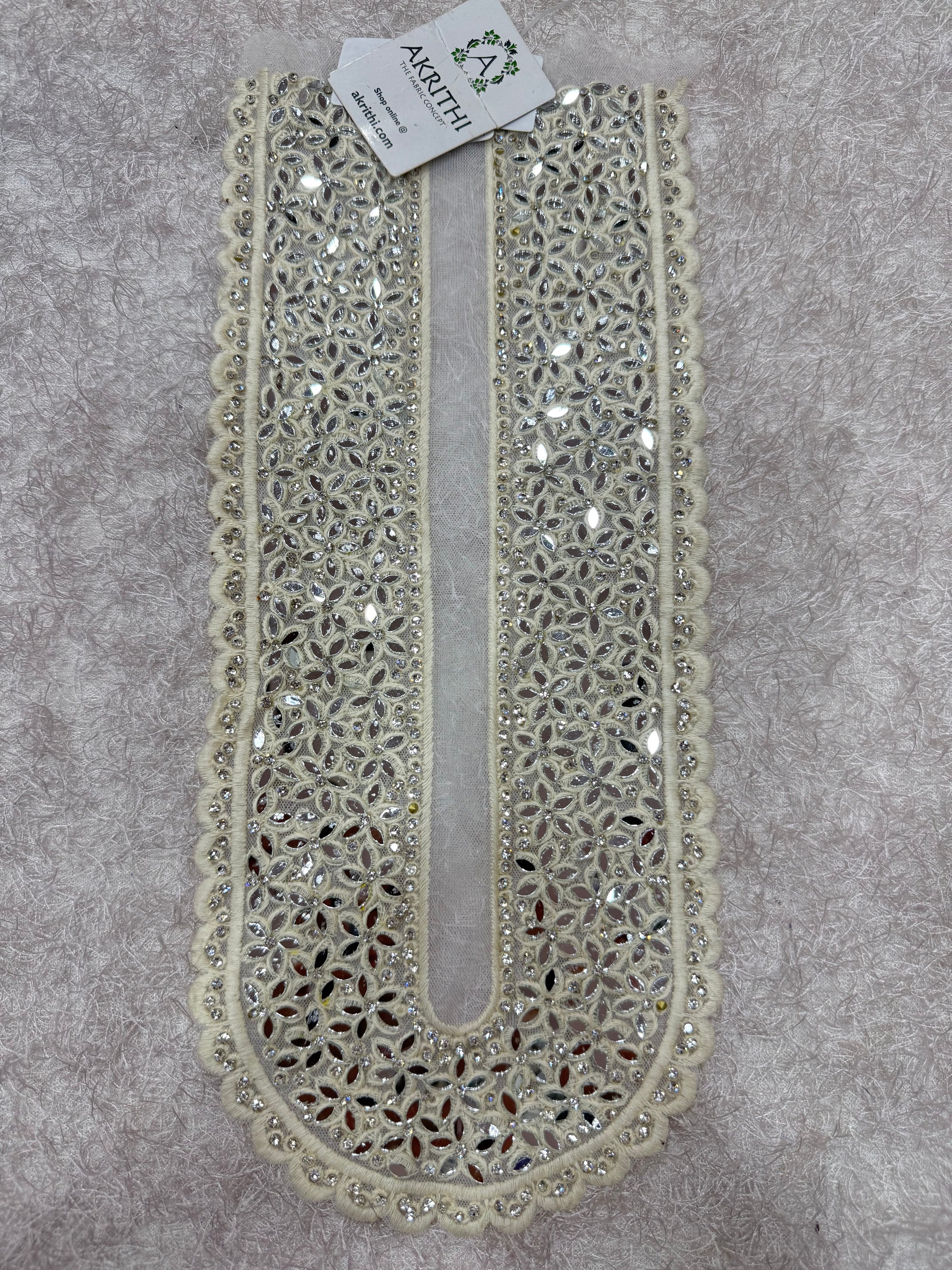 Embroidered neck piece