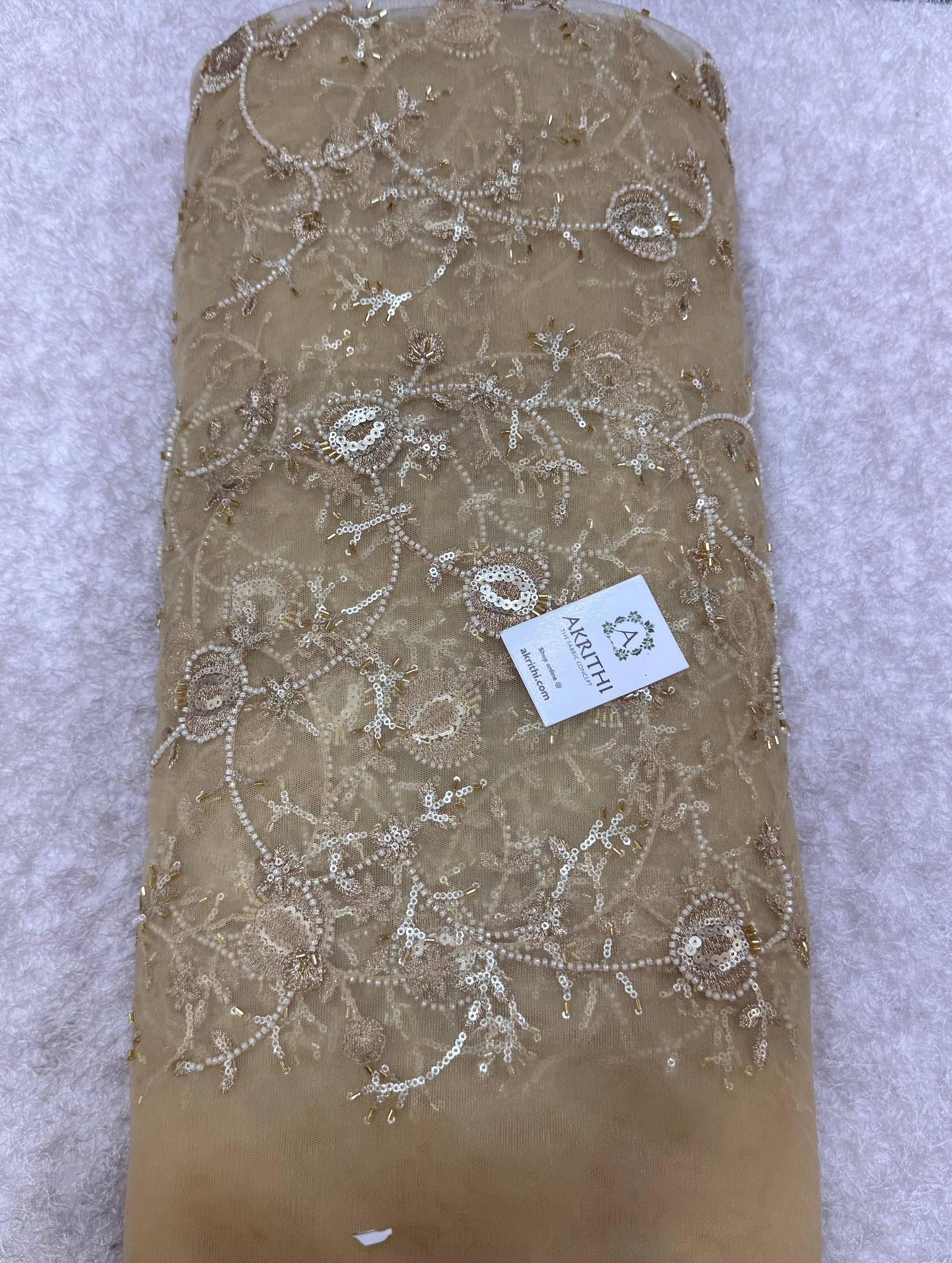 Embroidered gold net fabric