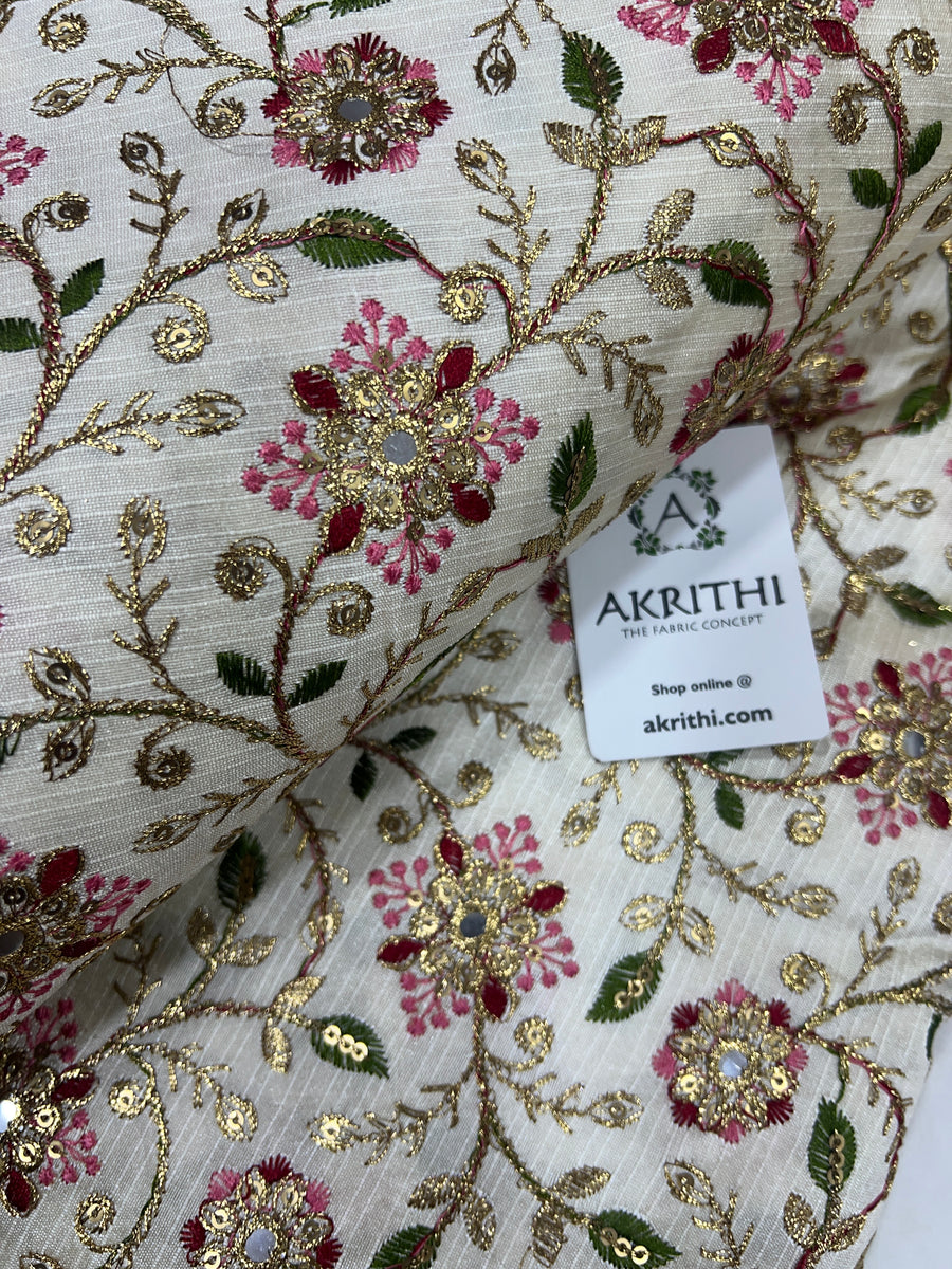 Embroidered raw silk fabric