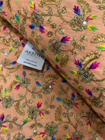 Embroidered raw silk fabric