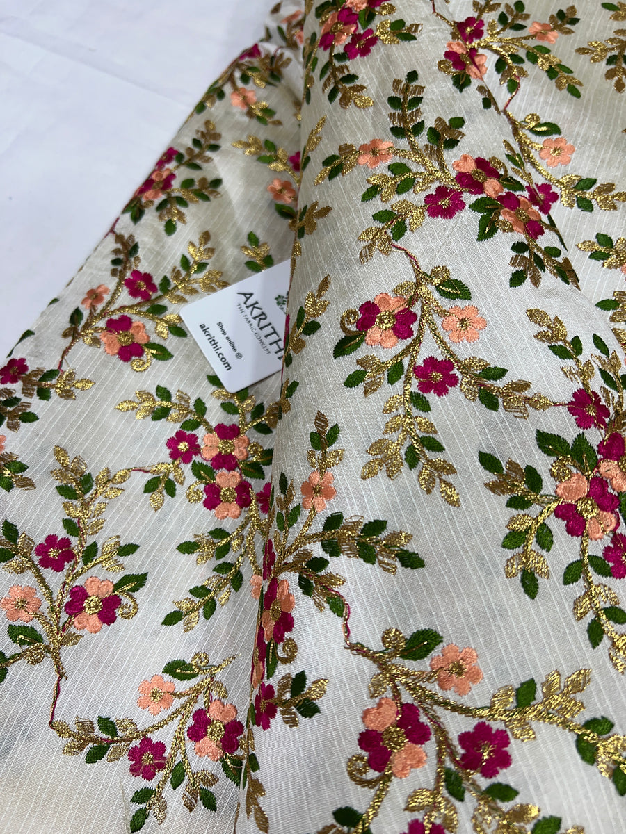 Embroidered raw silk fabric