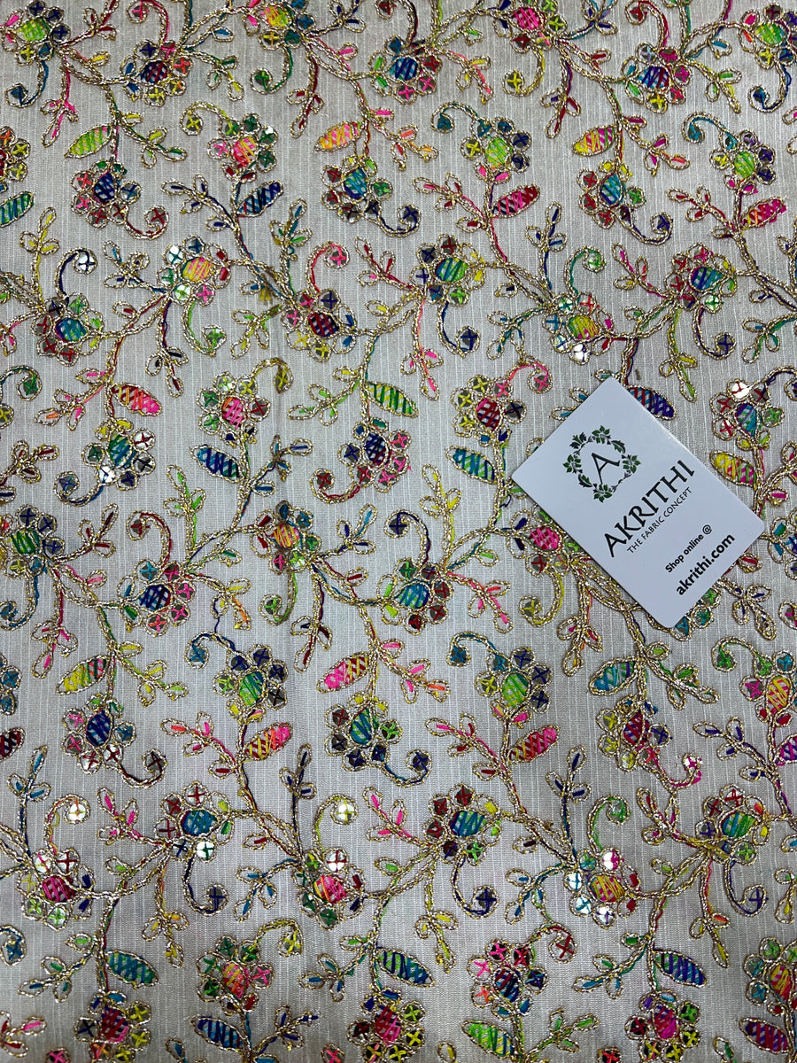 Embroidered raw silk fabric