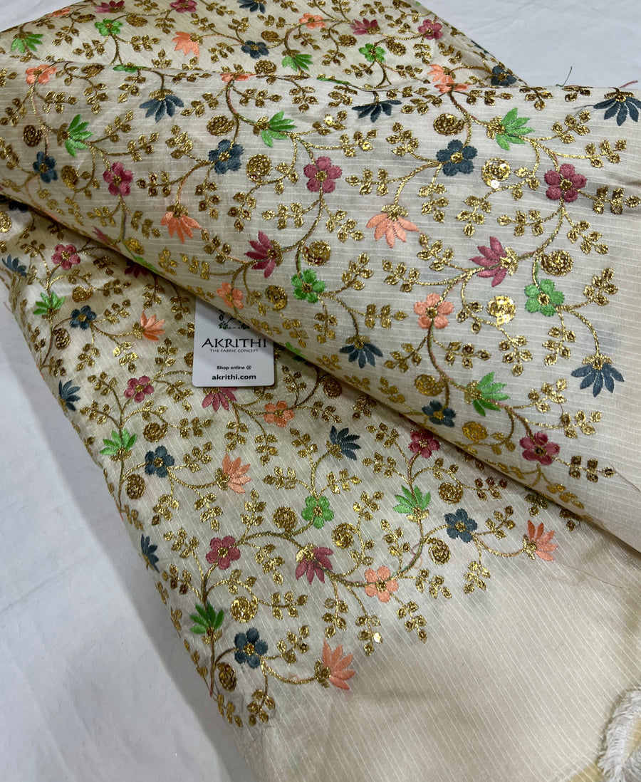 Embroidered raw silk fabric