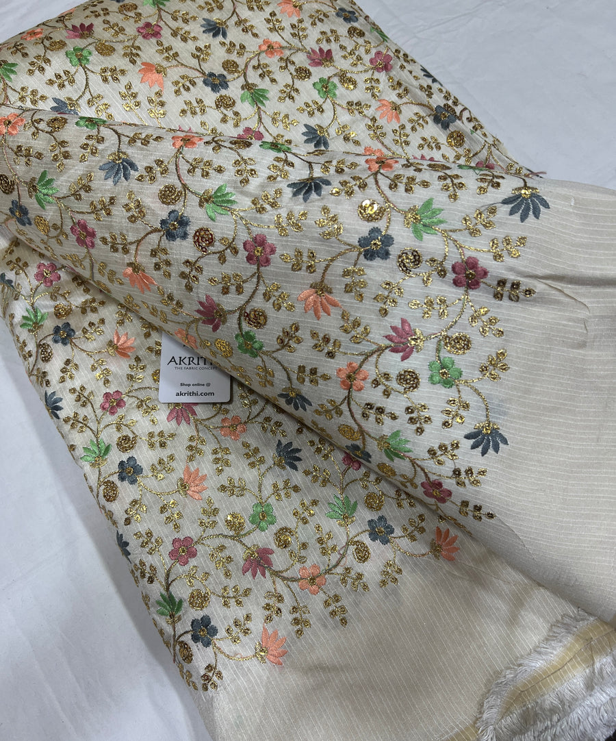 Embroidered raw silk fabric