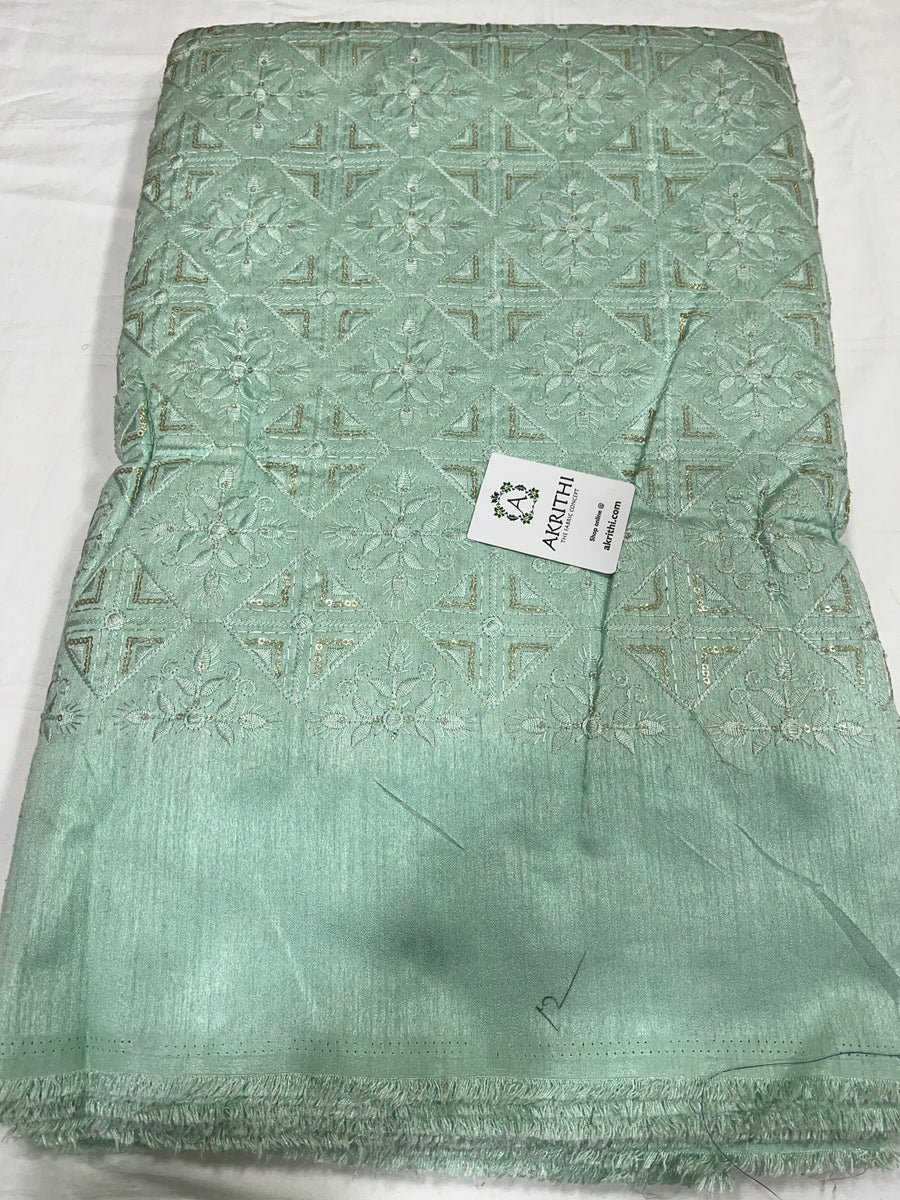 Embroidered raw silk fabric