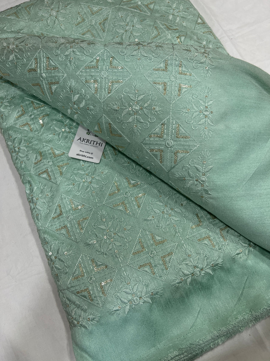 Embroidered raw silk fabric