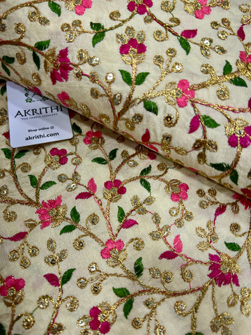 Embroidered raw silk fabric