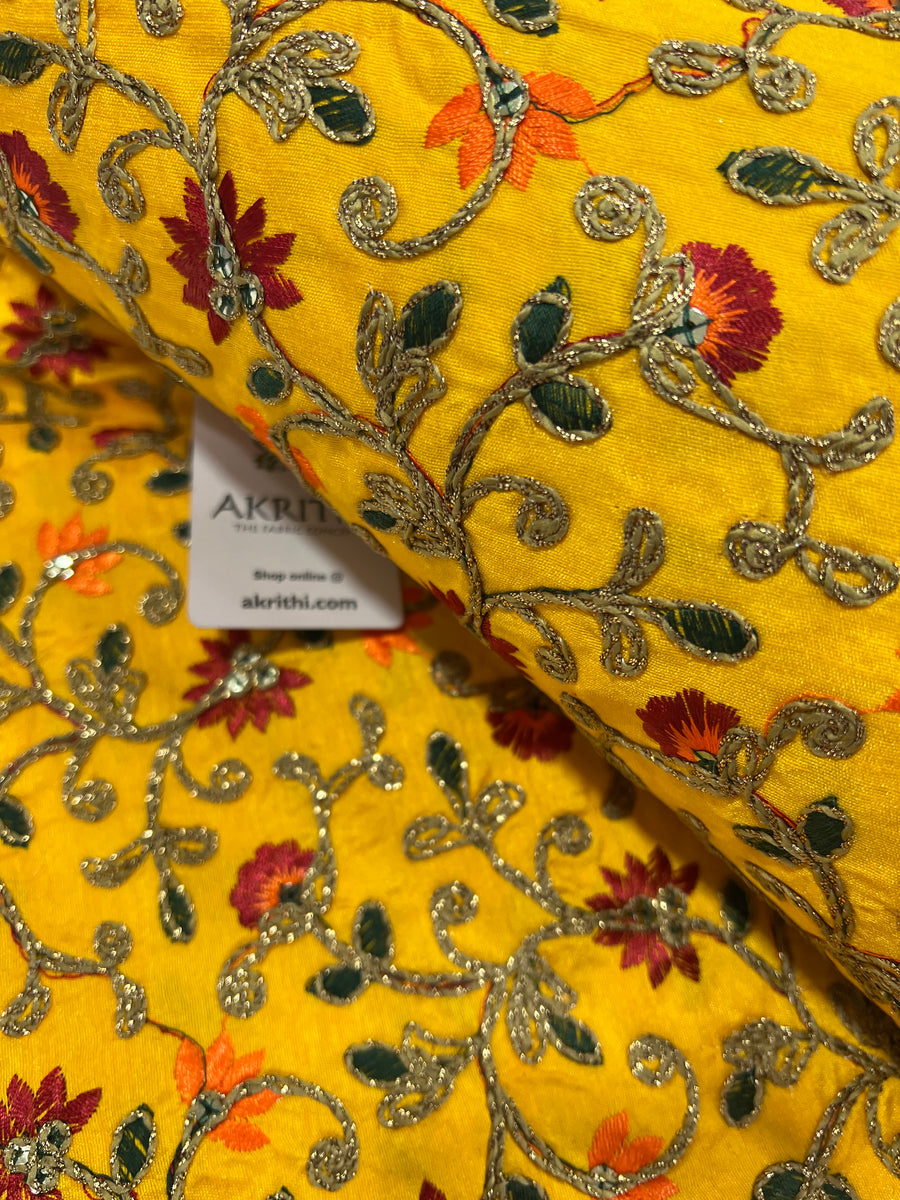 Embroidered raw silk fabric