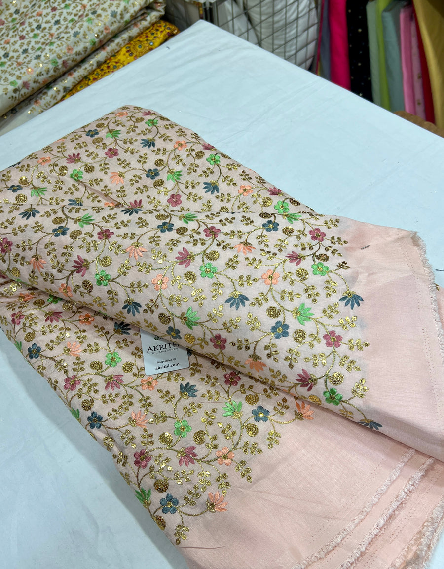 Embroidered raw silk fabric