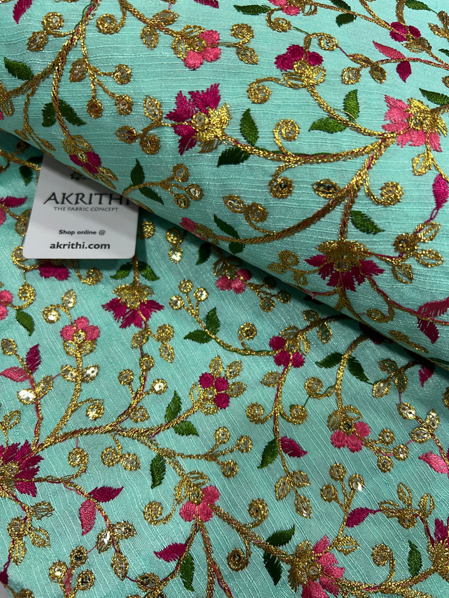 Embroidered raw silk fabric