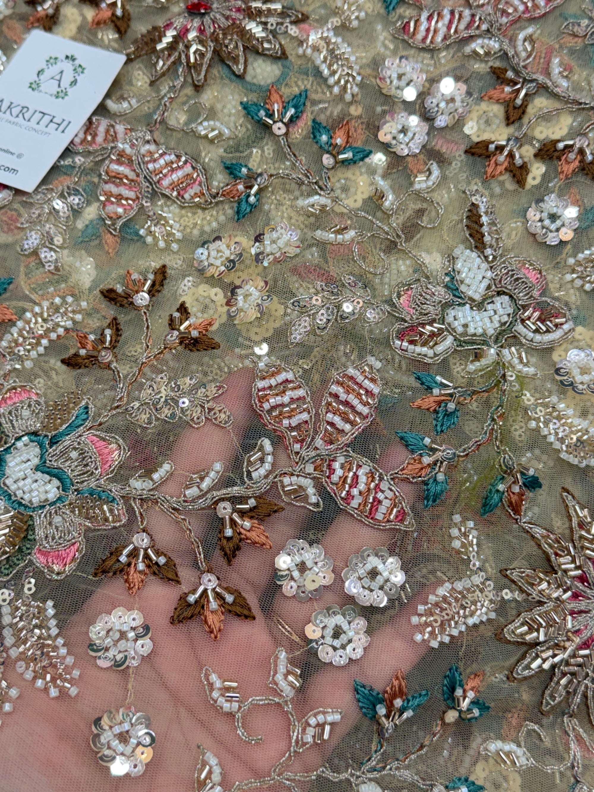 Embroidered gold net fabric