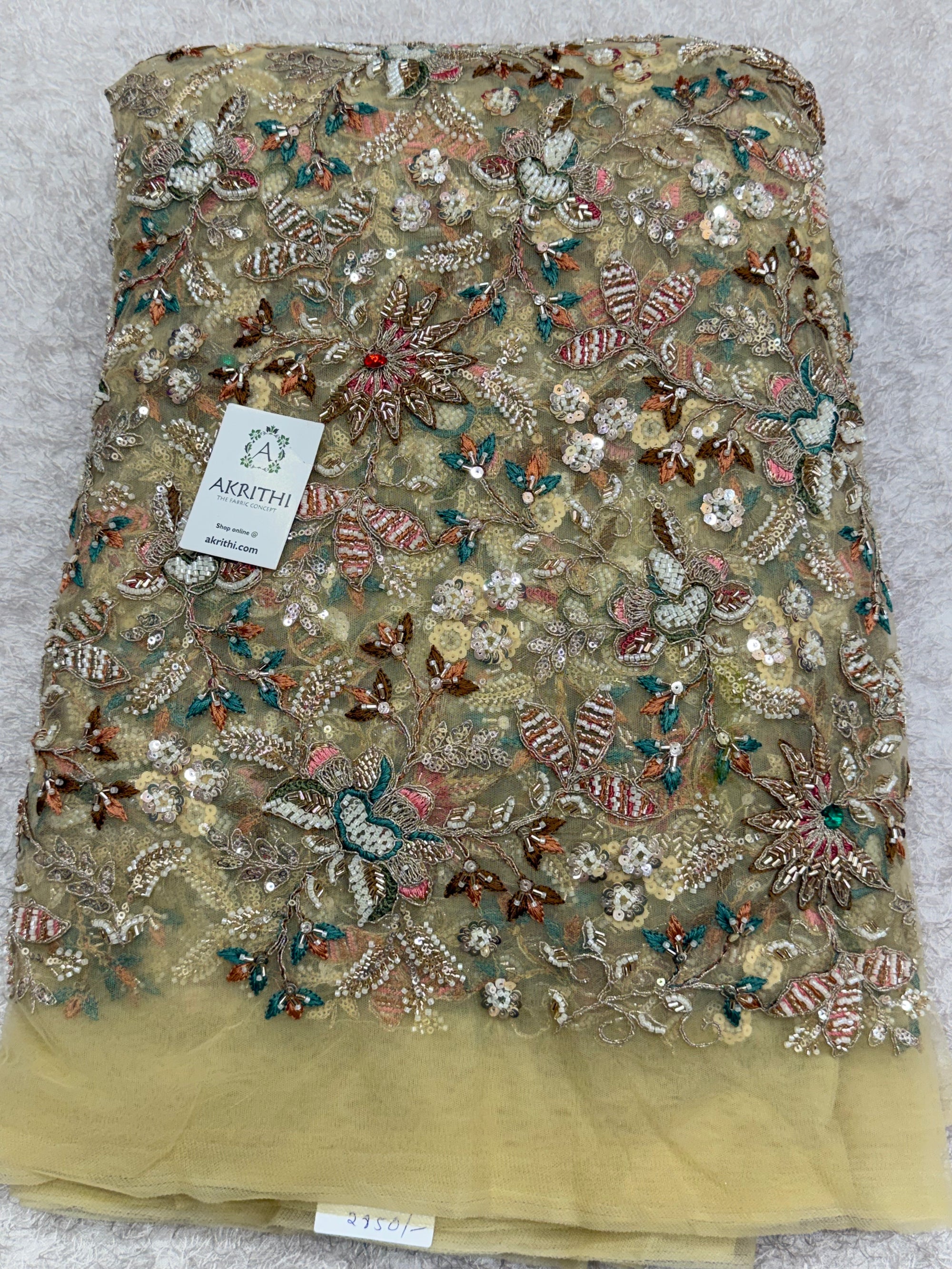 Embroidered gold net fabric