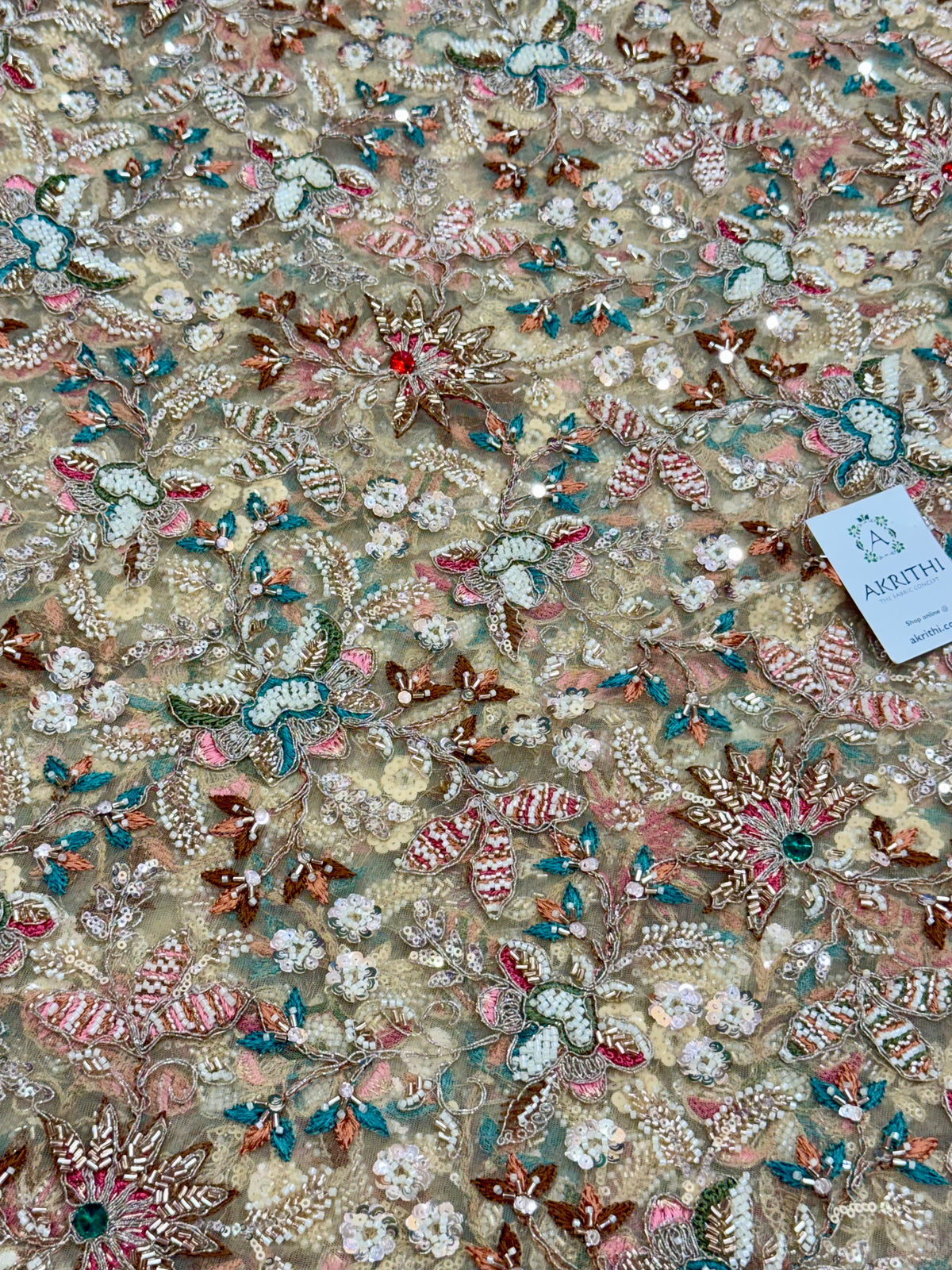 Embroidered gold net fabric