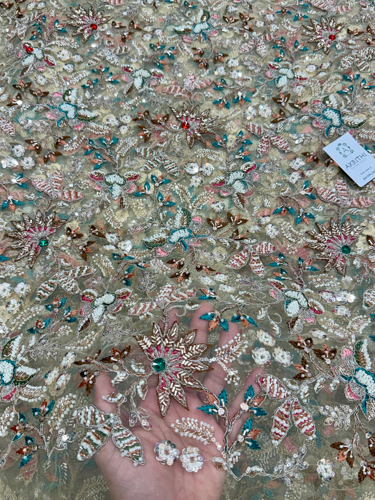 Embroidered gold net fabric