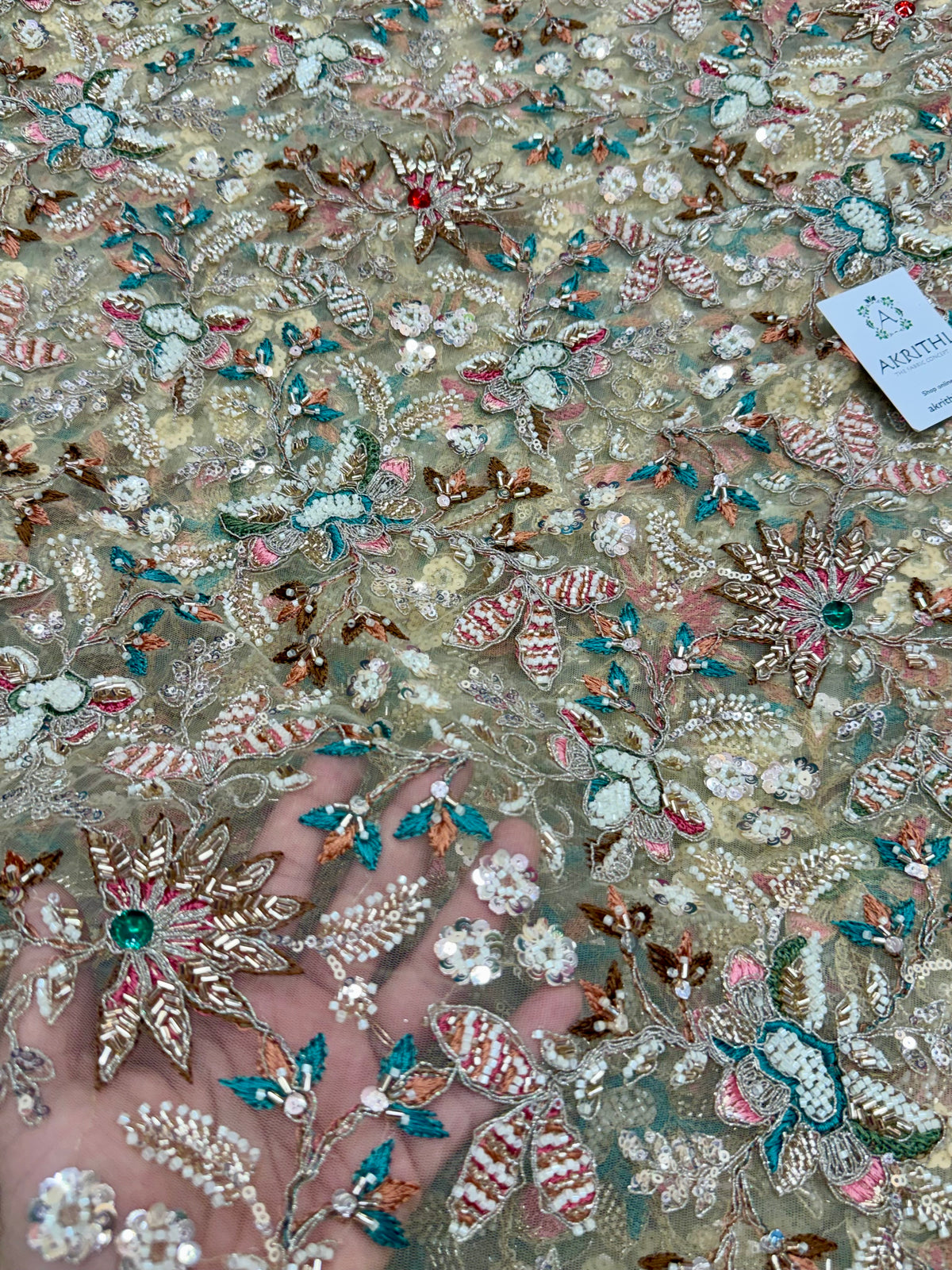 Embroidered gold net fabric