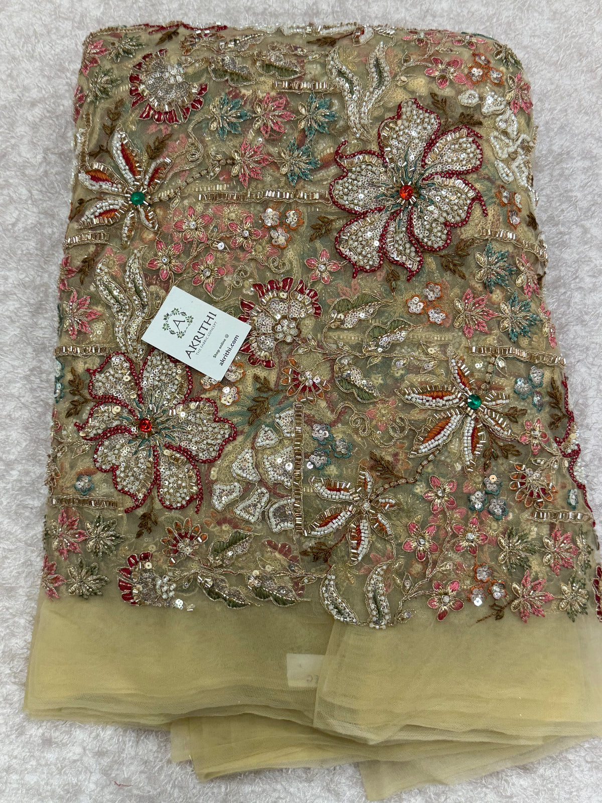 Embroidered gold net fabric