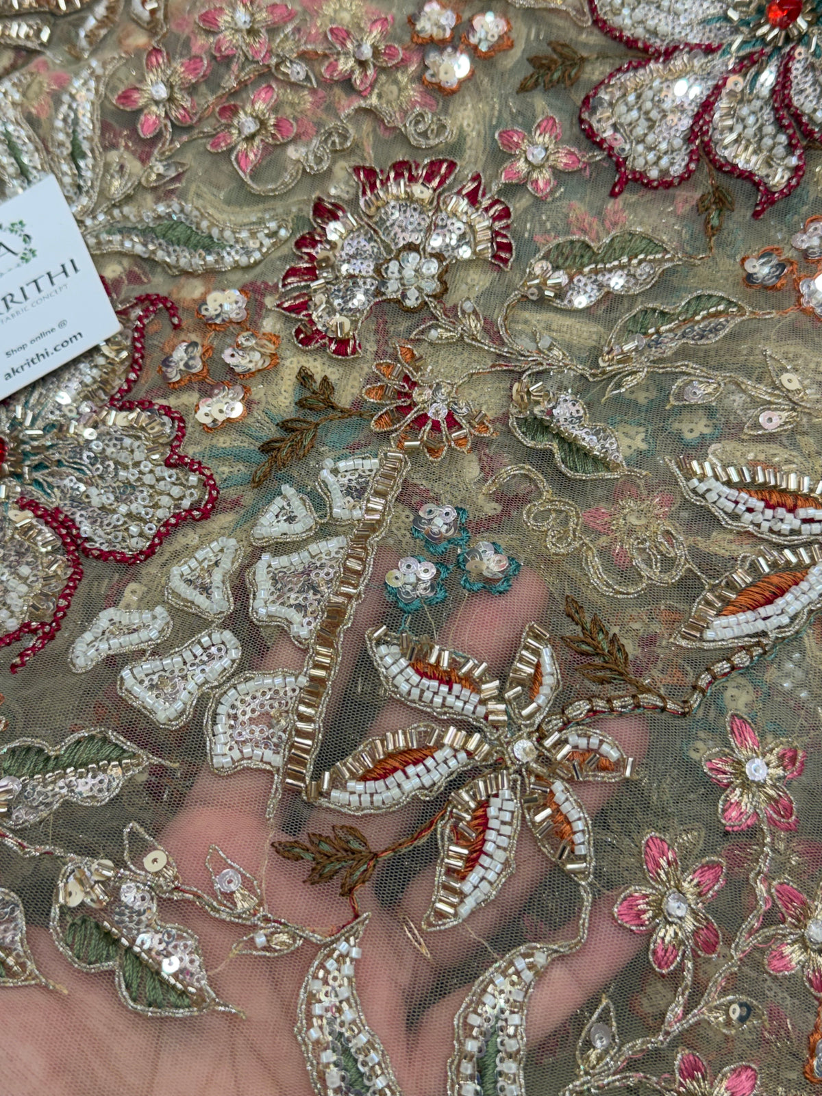 Embroidered gold net fabric