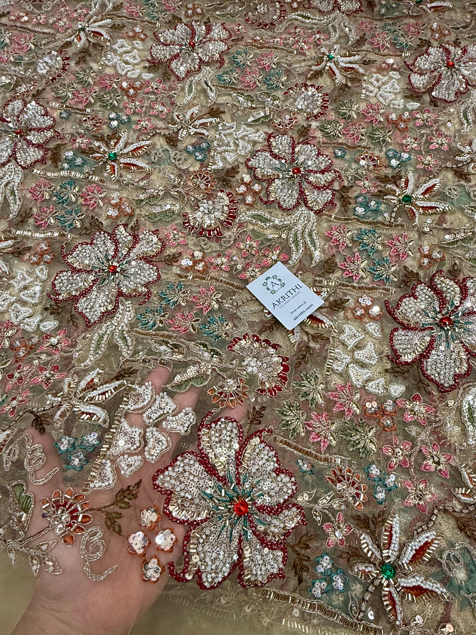 Embroidered gold net fabric