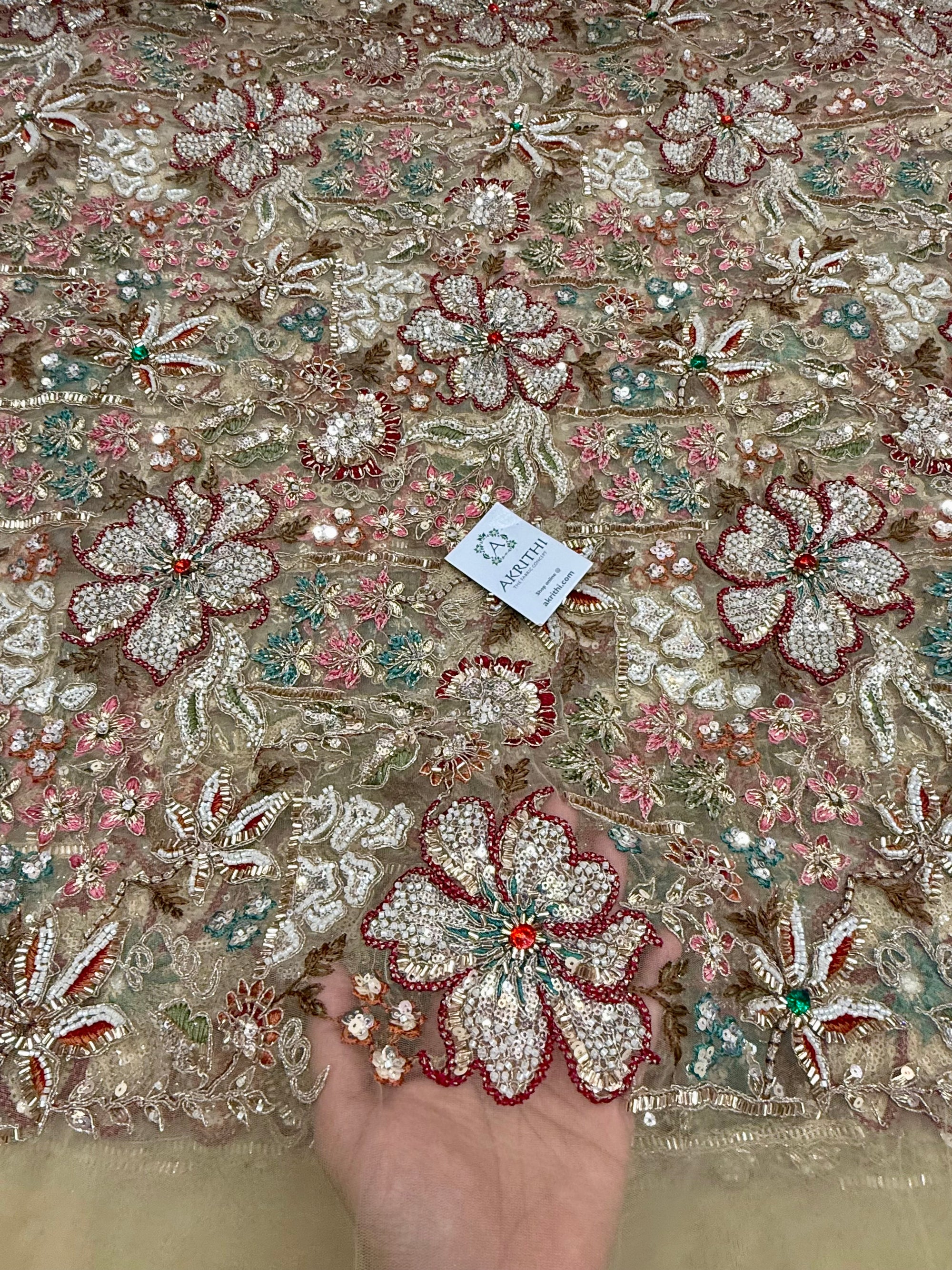 Embroidered gold net fabric