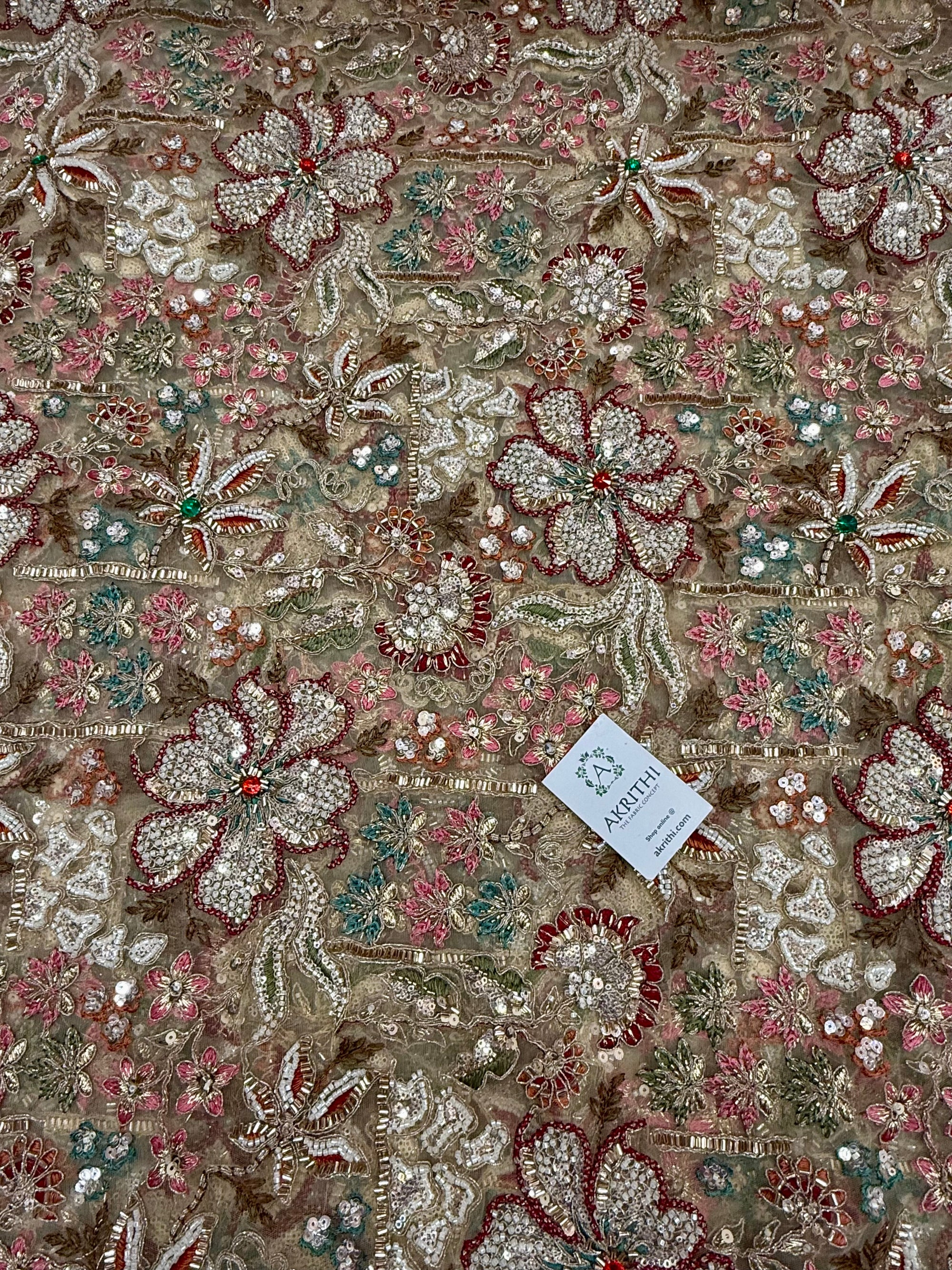 Embroidered gold net fabric