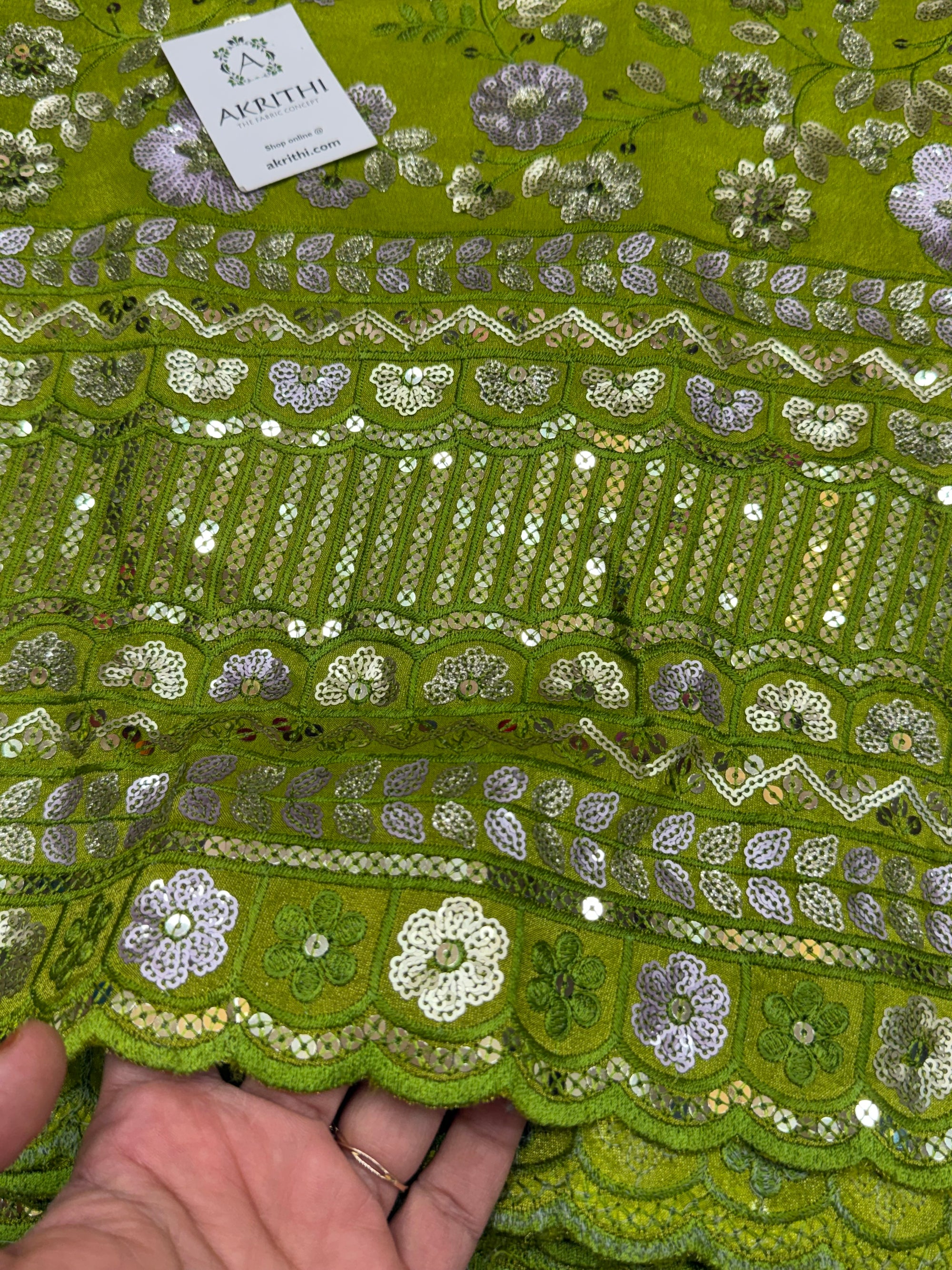 Embroidered tissue crepe fabric