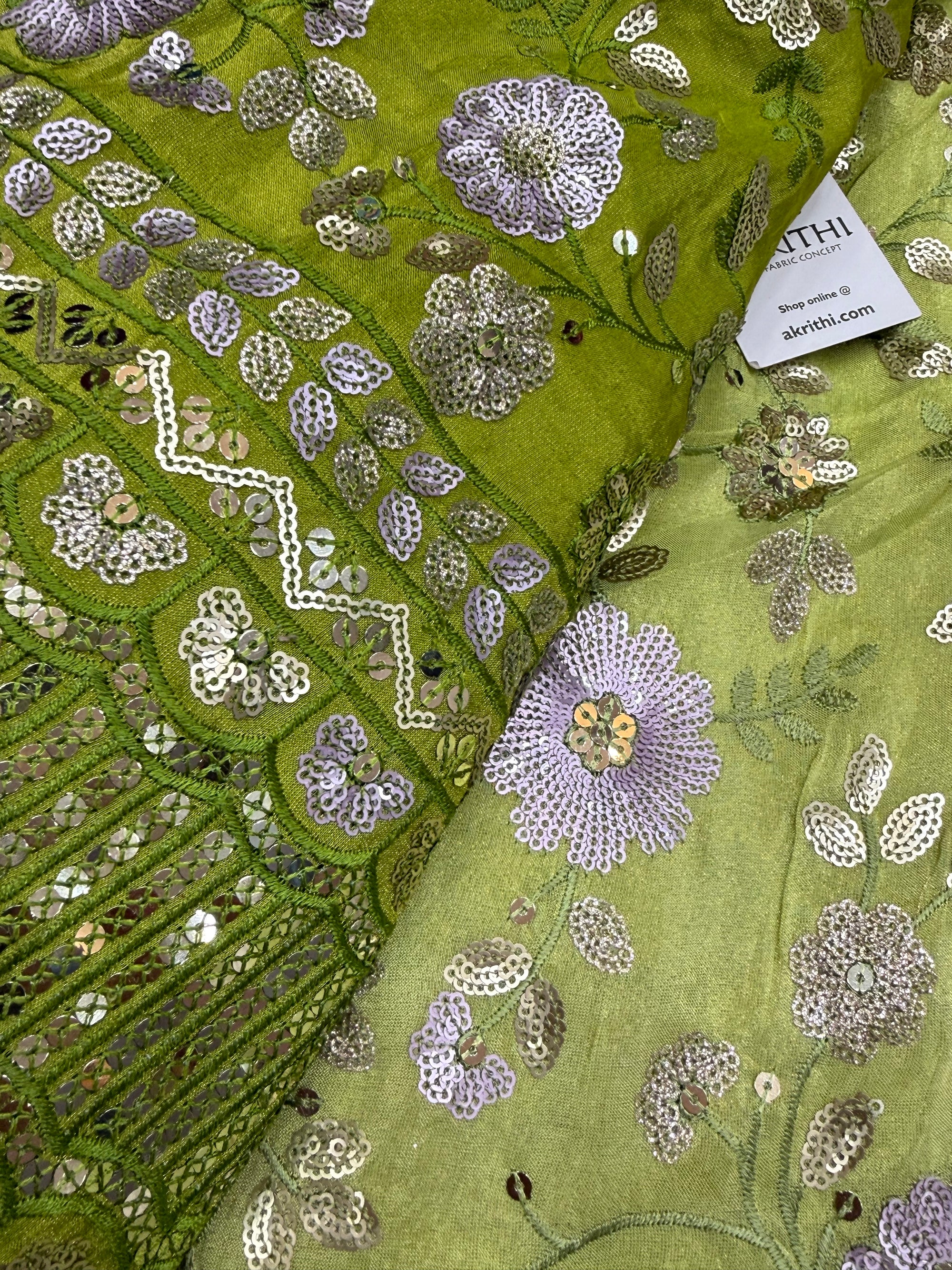 Embroidered tissue crepe fabric