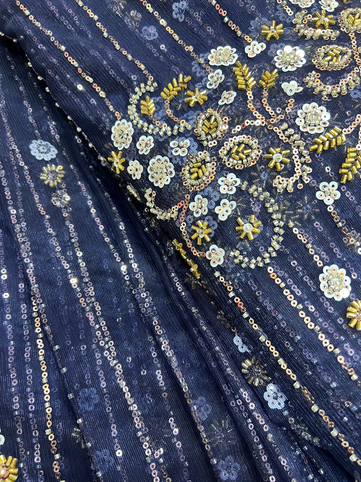 Embroidered net fabric
