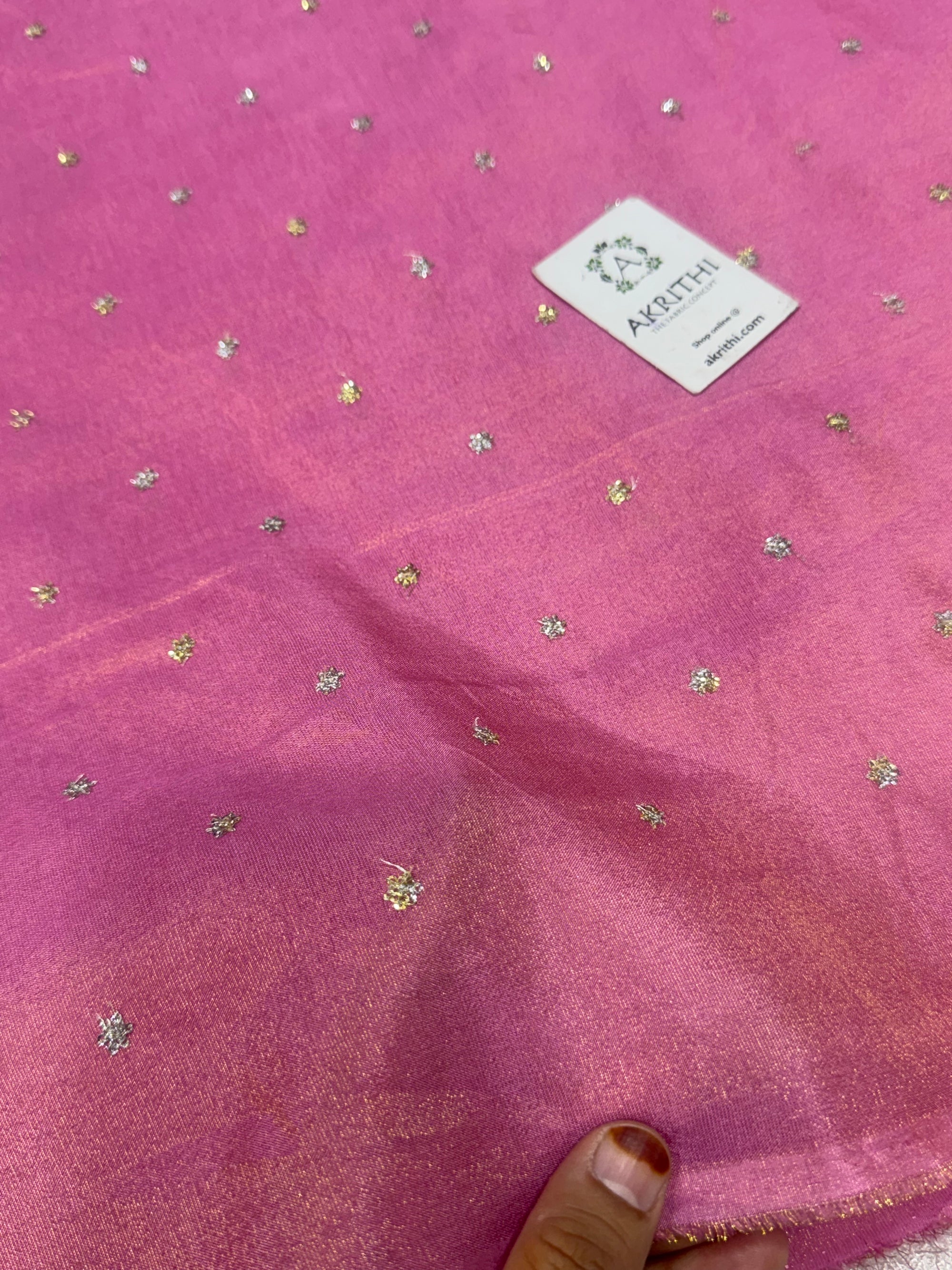 Sequins on tissue crepe fabric