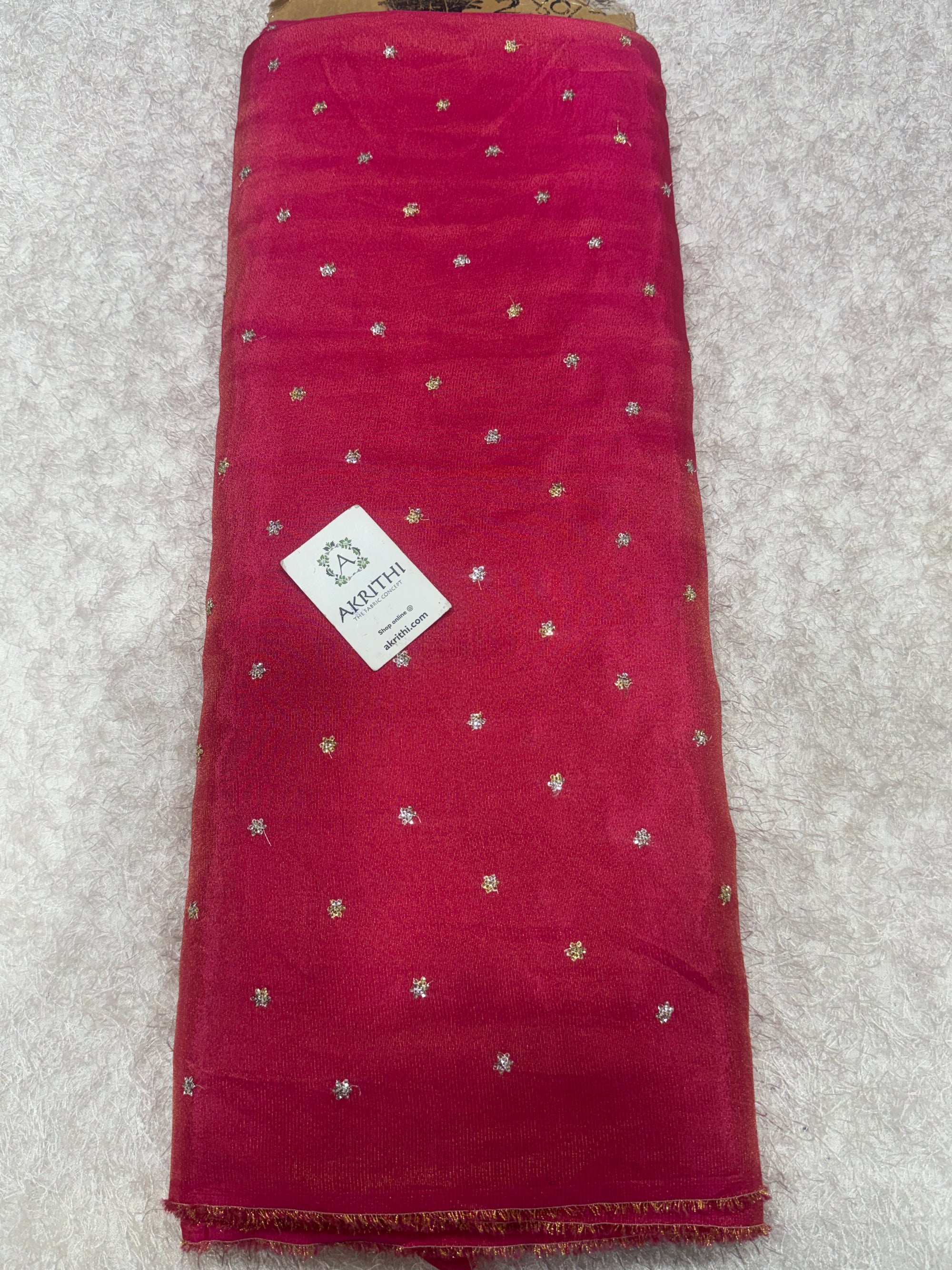 Sequins on tissue crepe fabric
