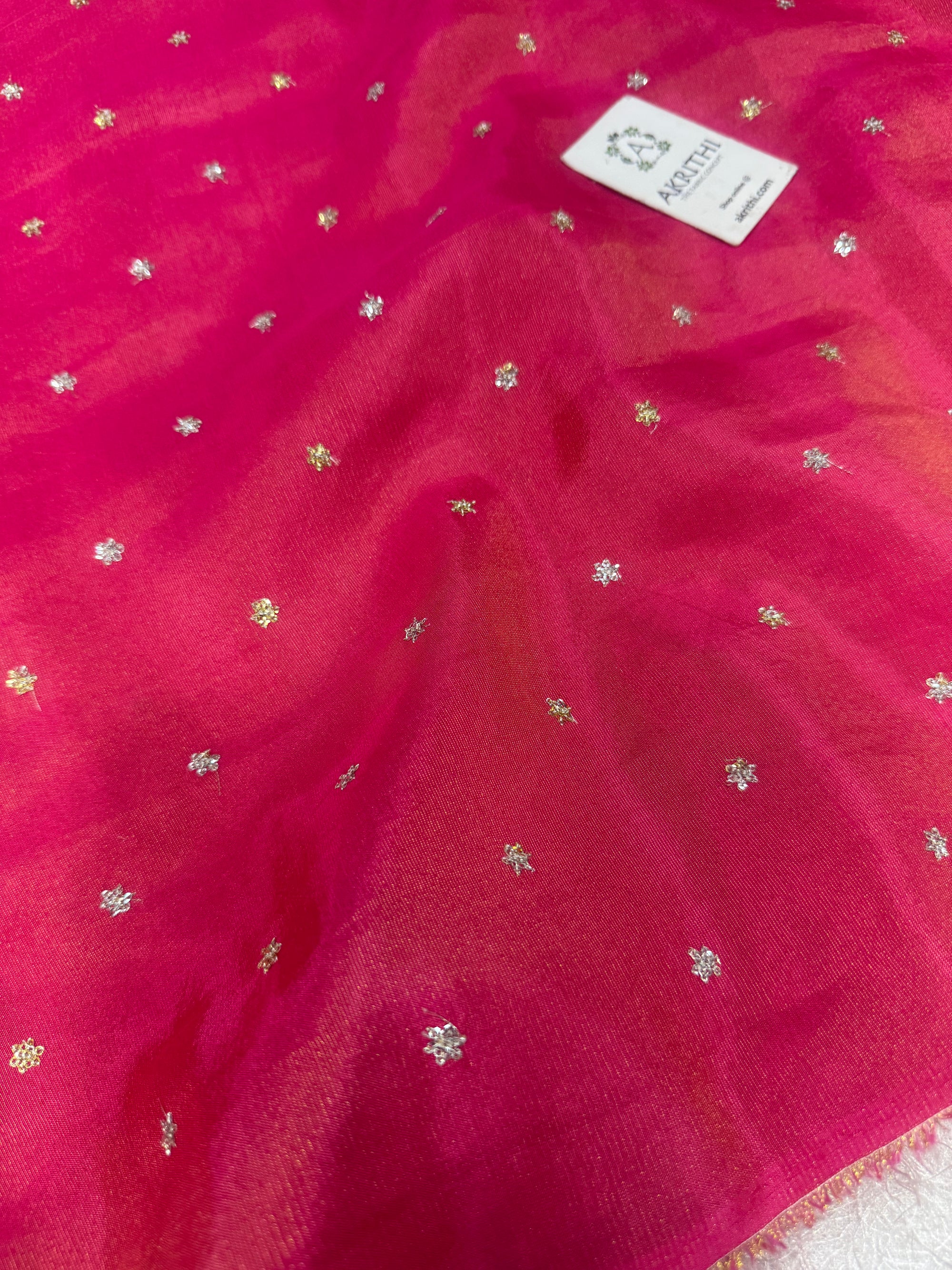 Sequins on tissue crepe fabric