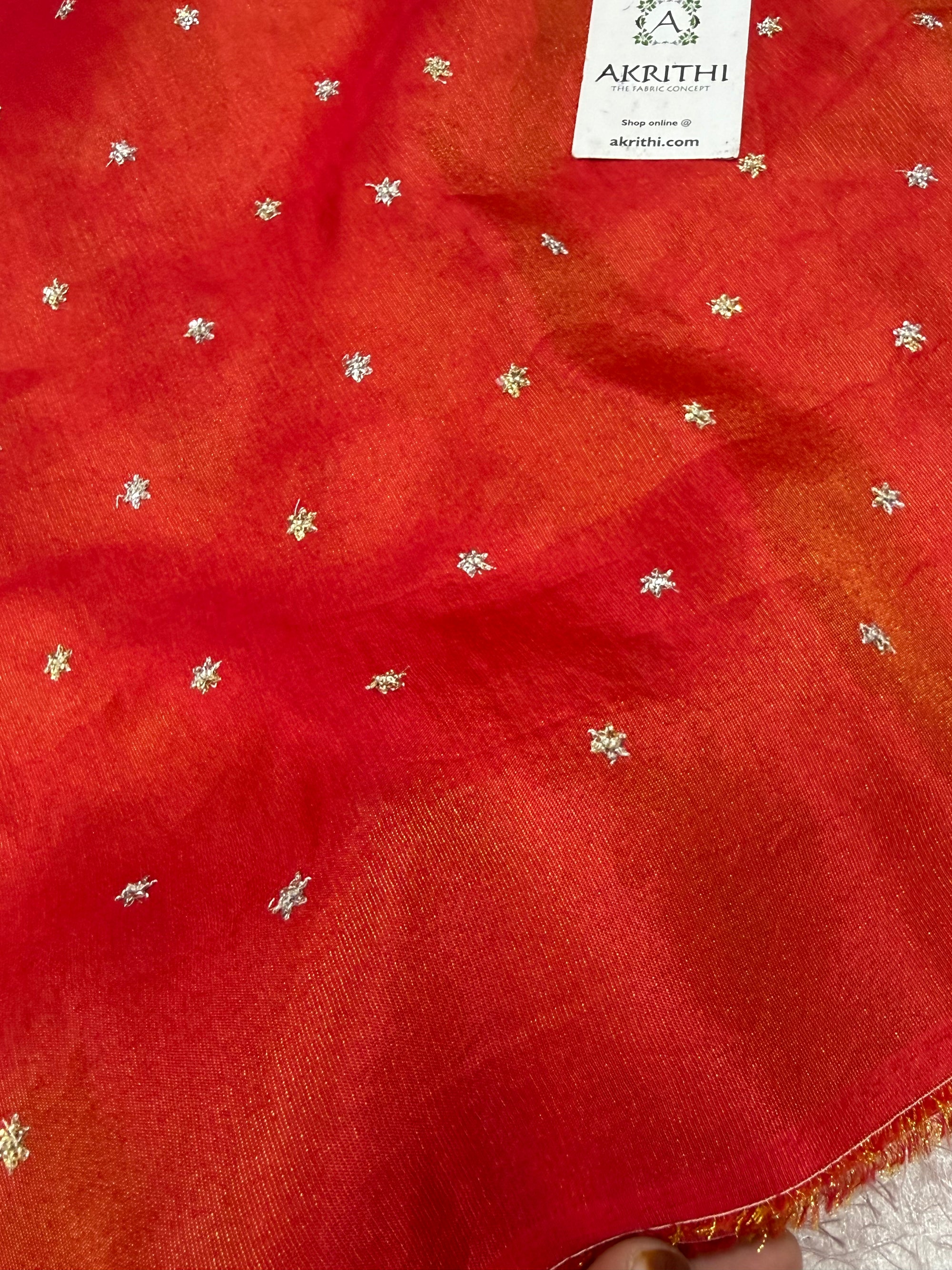 Sequins on tissue crepe fabric