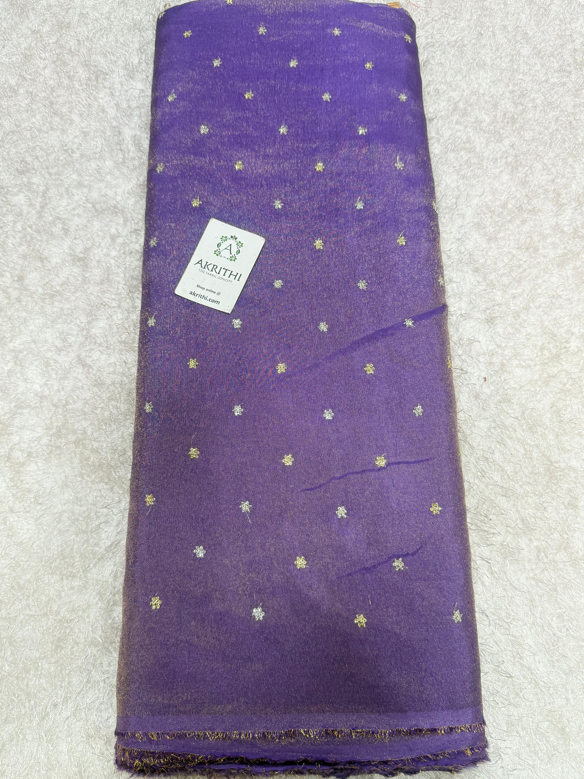 Sequins on tissue crepe fabric