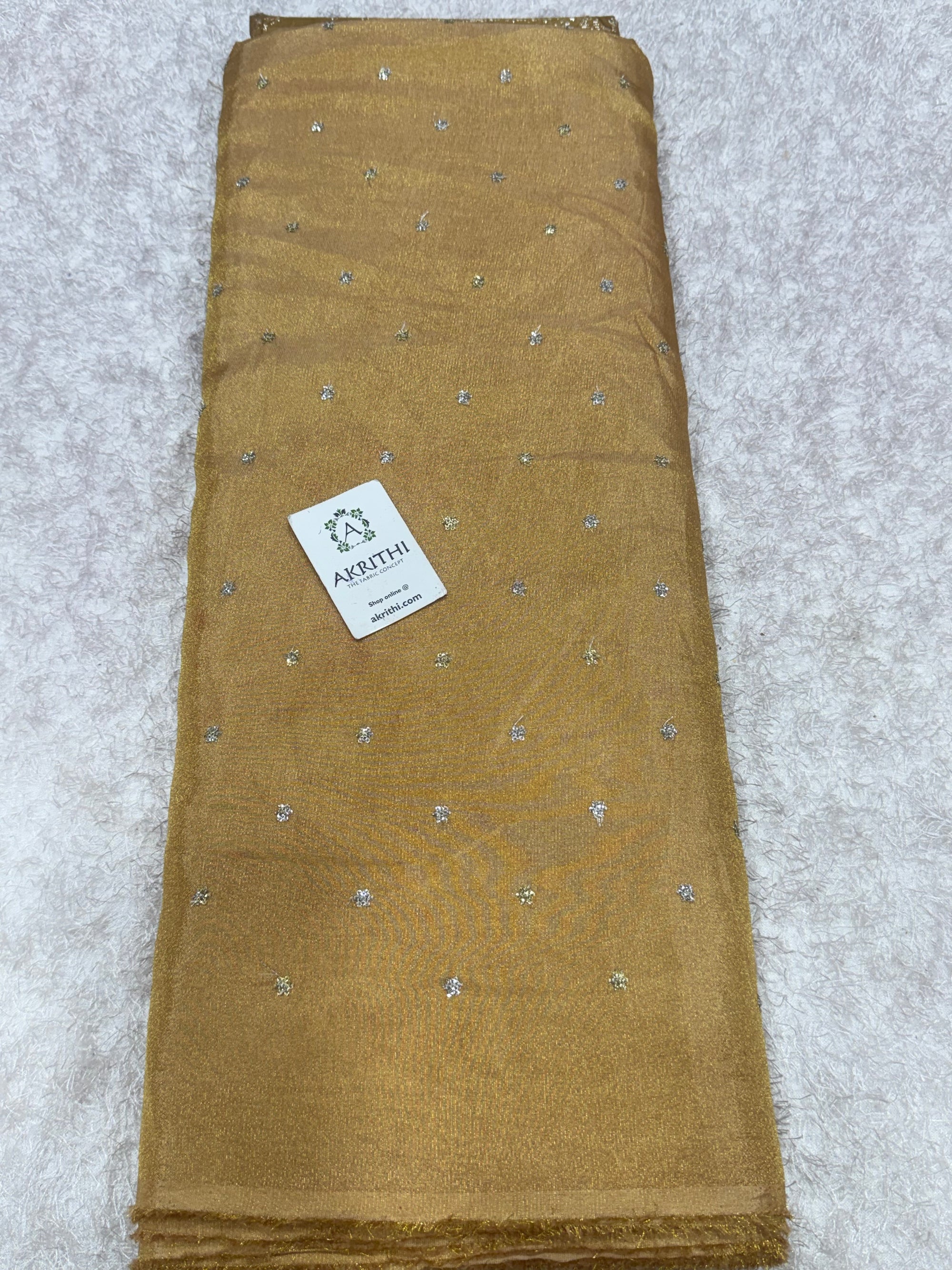 Sequins on tissue crepe fabric