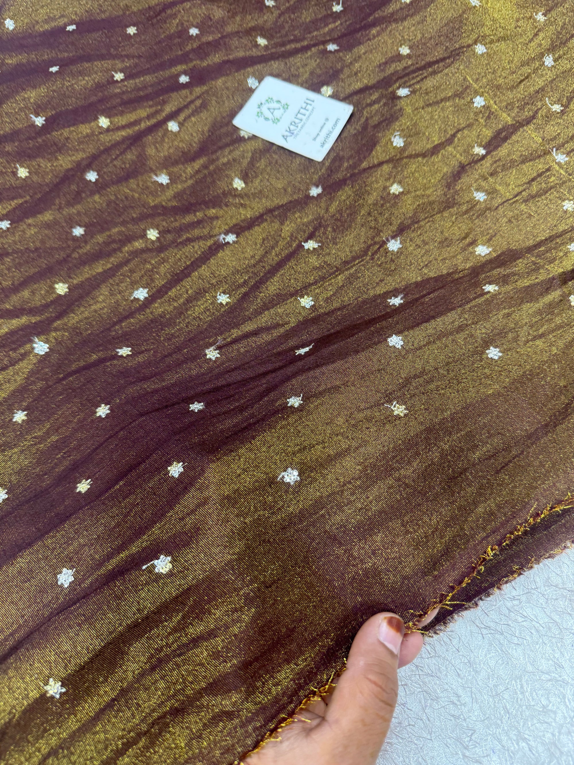 Sequins on tissue crepe fabric