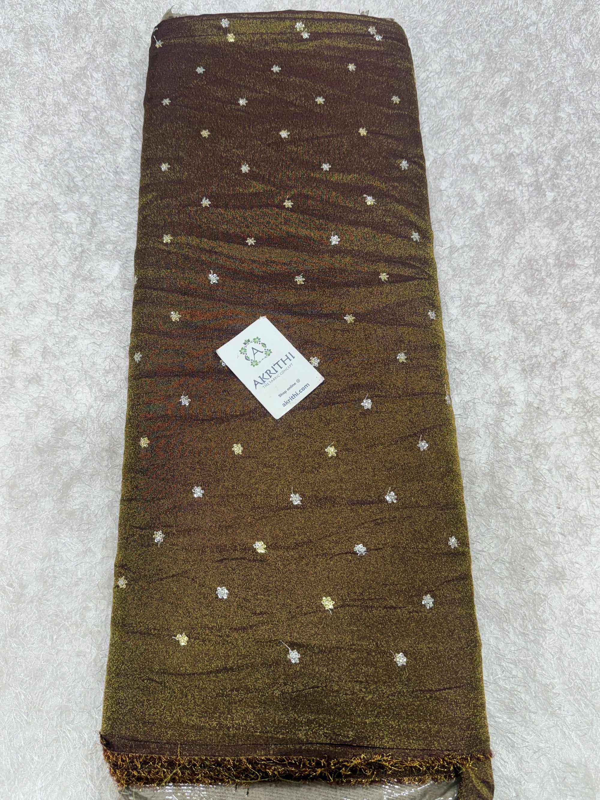 Sequins on tissue crepe fabric
