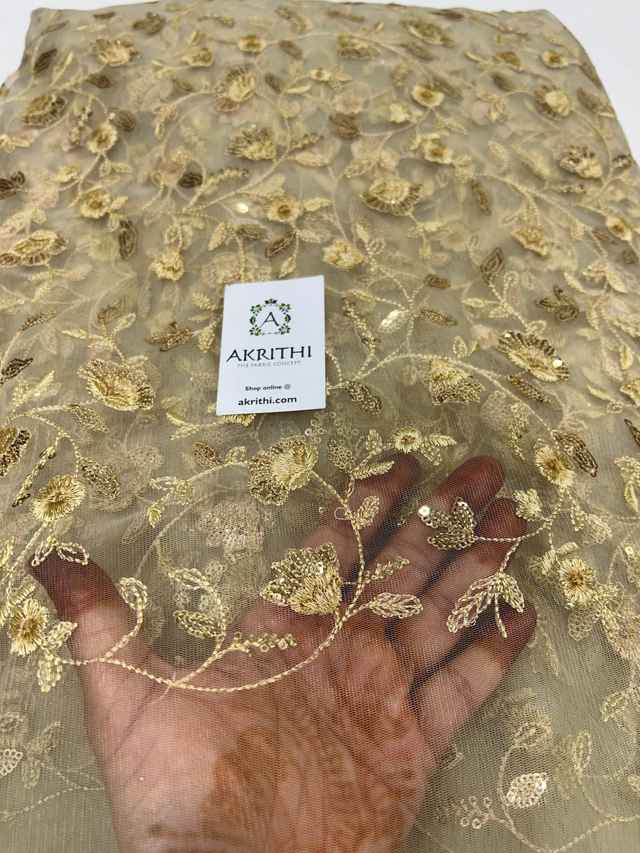 Embroidered net fabric