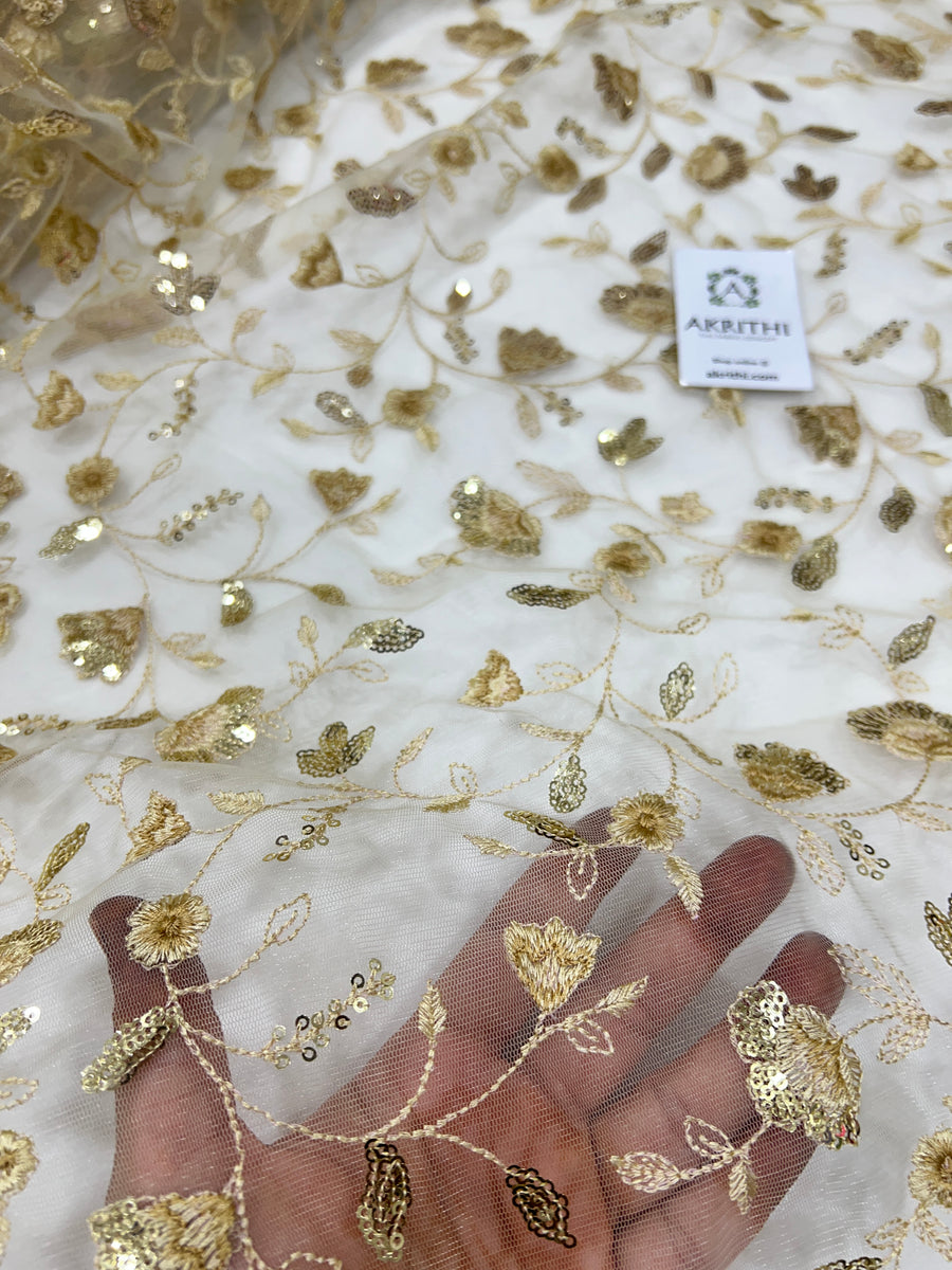 Embroidered net fabric