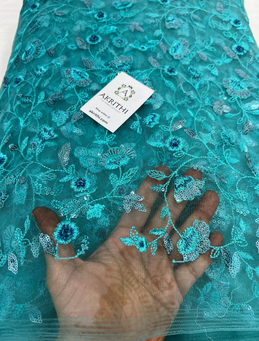 Embroidered net fabric