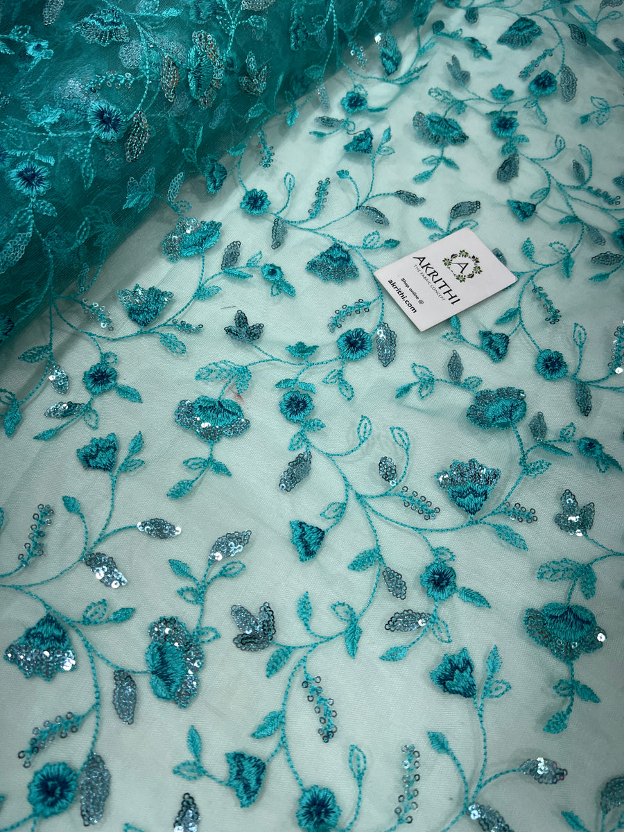 Embroidered net fabric