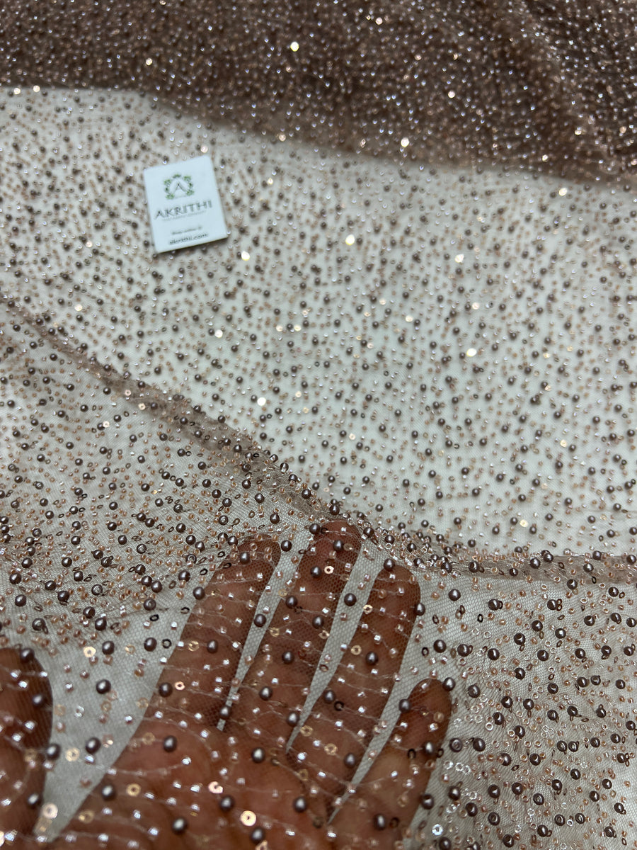 Embroidered net fabric