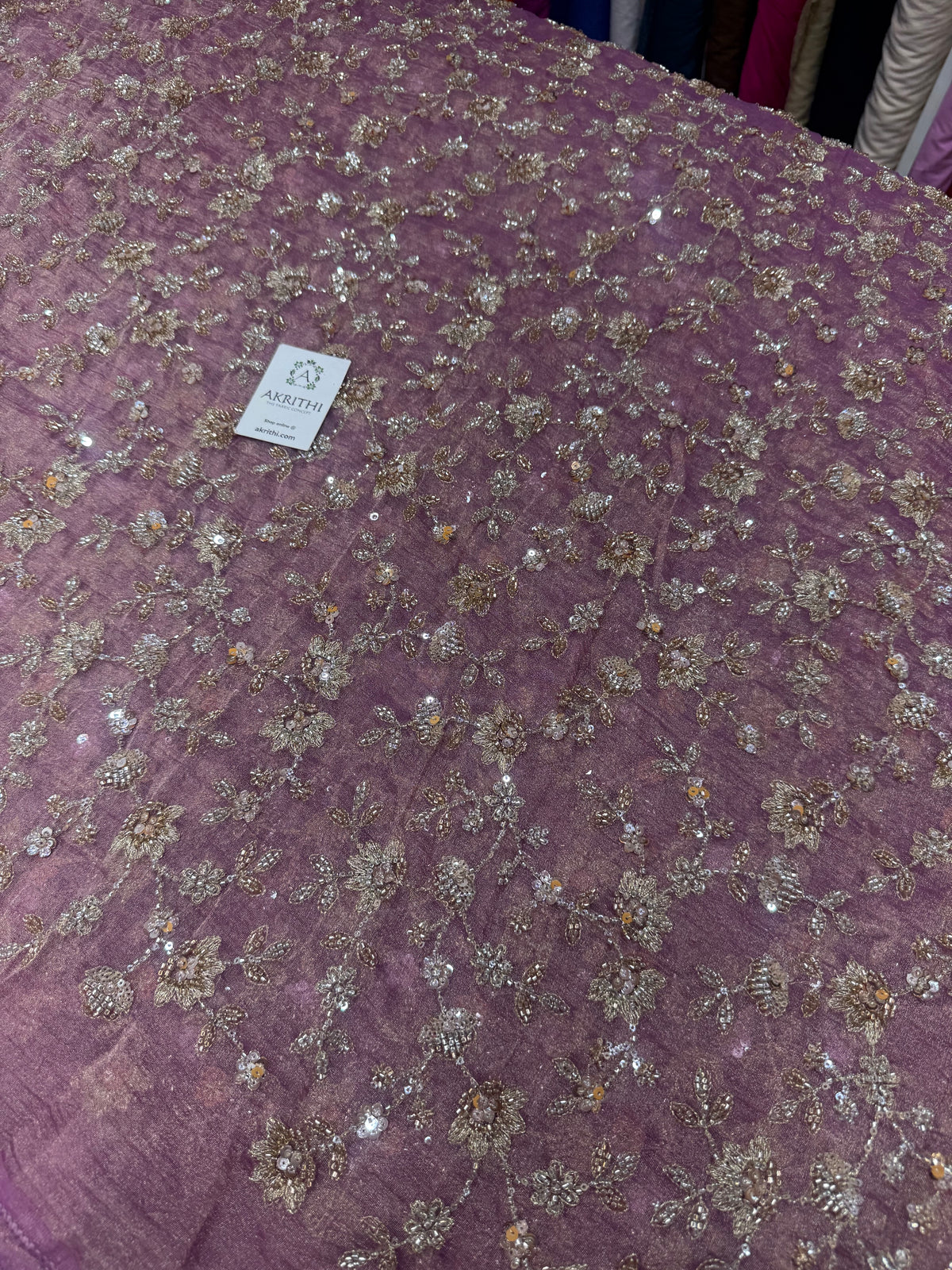 Embroidered crushed tissue fabric
