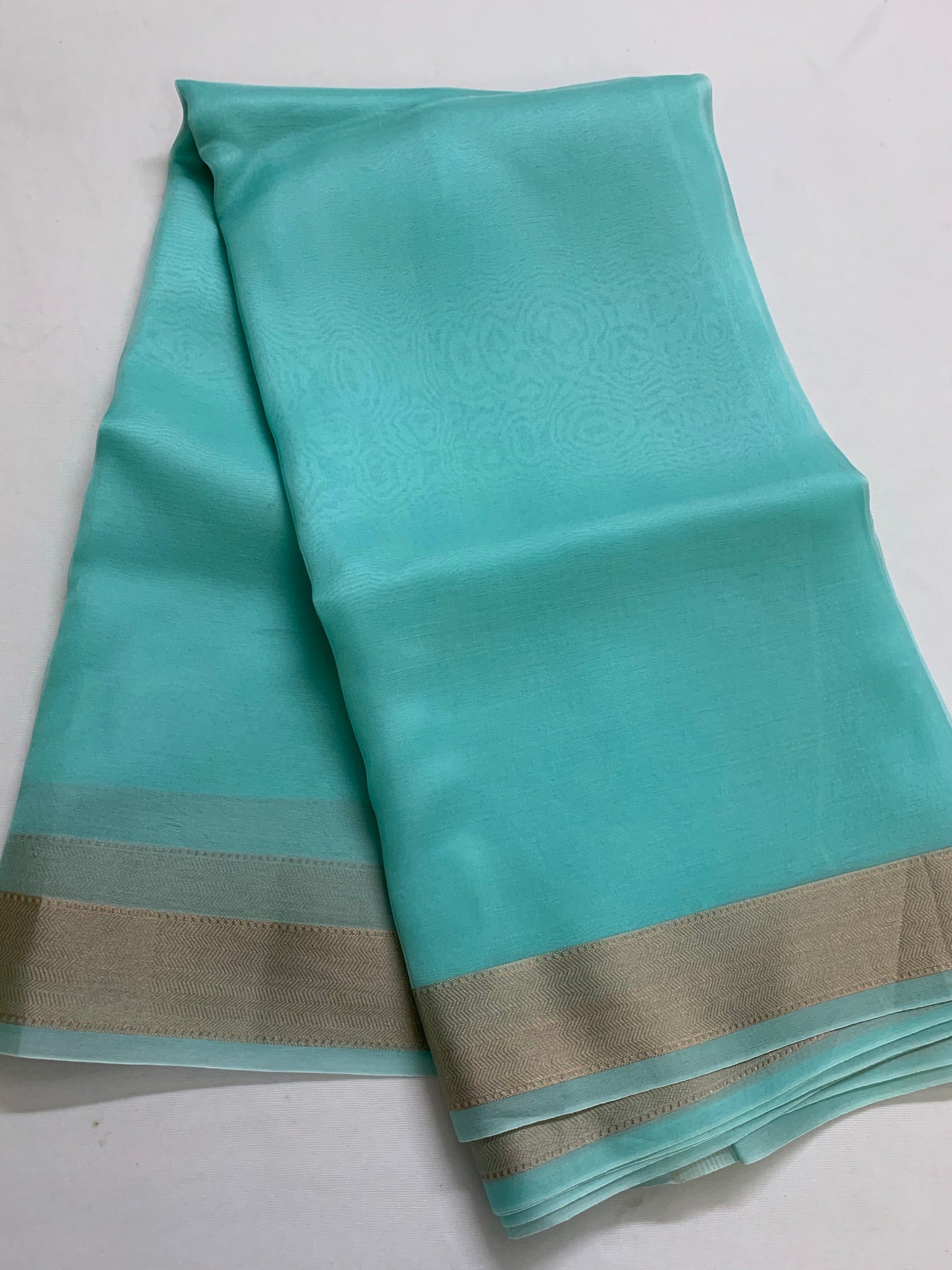 Pure silk organza saree with zari border