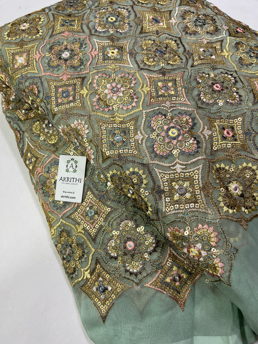 Heavy Embroidery on slate green Georgette fabric