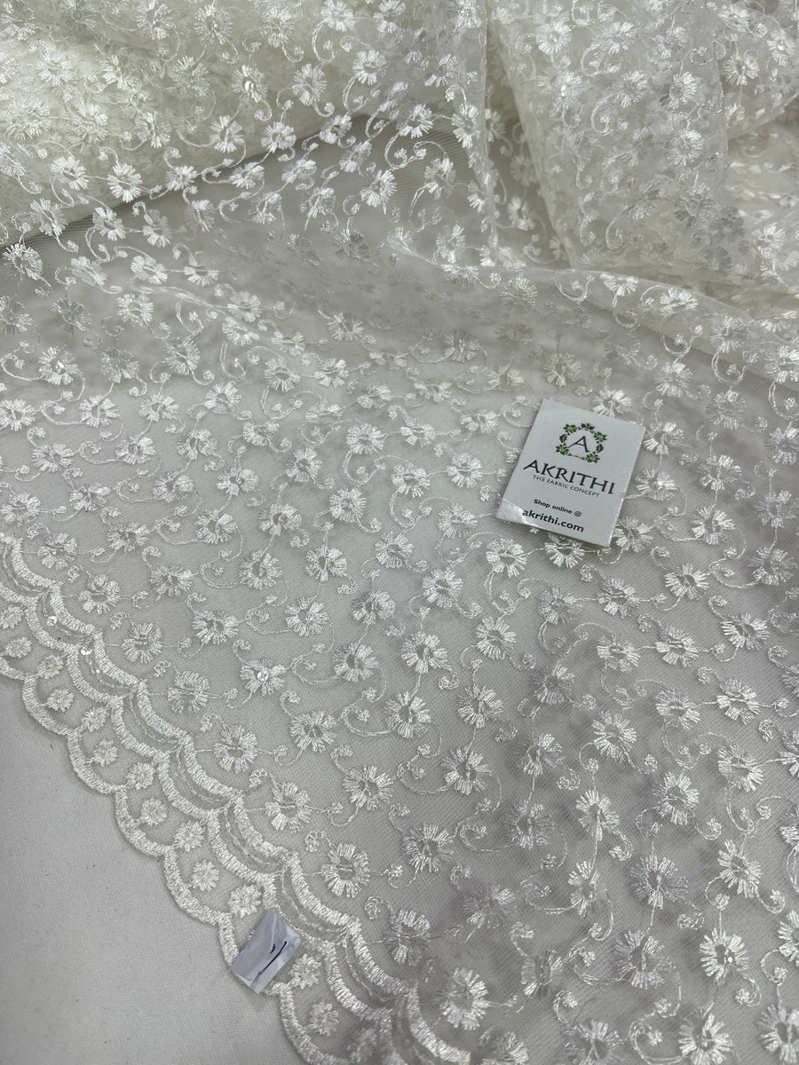 Embroidery on net fabric