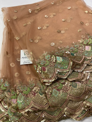 Embroidery on net fabric