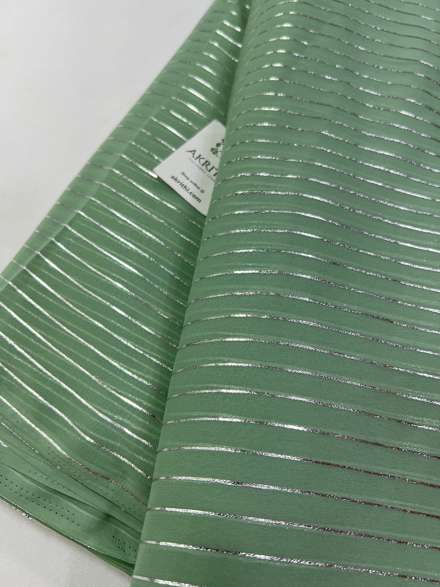 Foil printed slate green georgette fabric