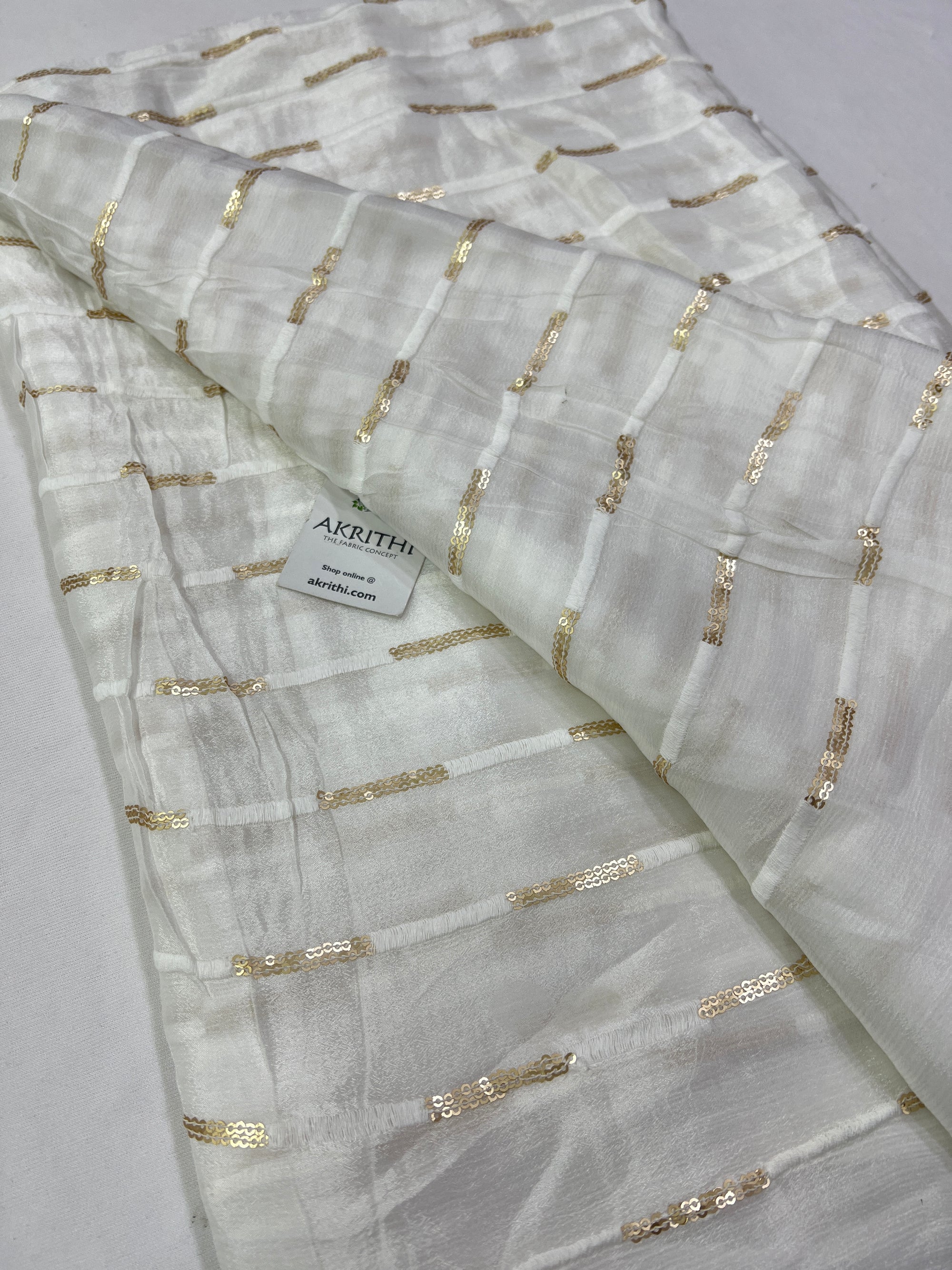 Dyeable embroidered chinon fabric